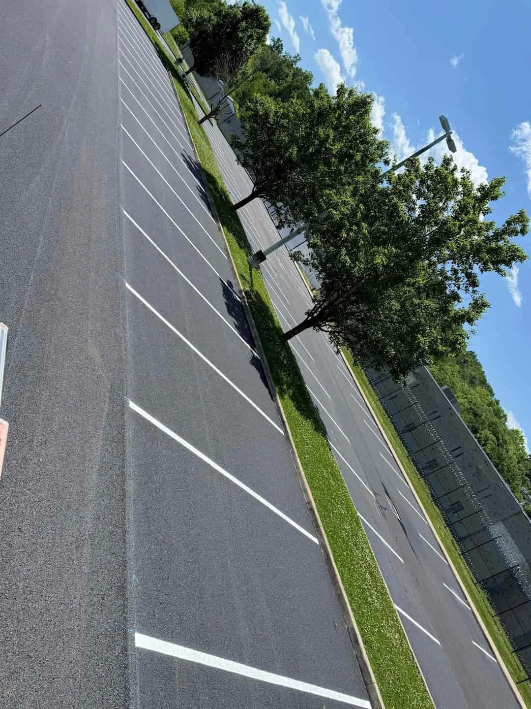 Parking lot measuring and layout process for commercial parking lot striping project in Clarksburg WV.