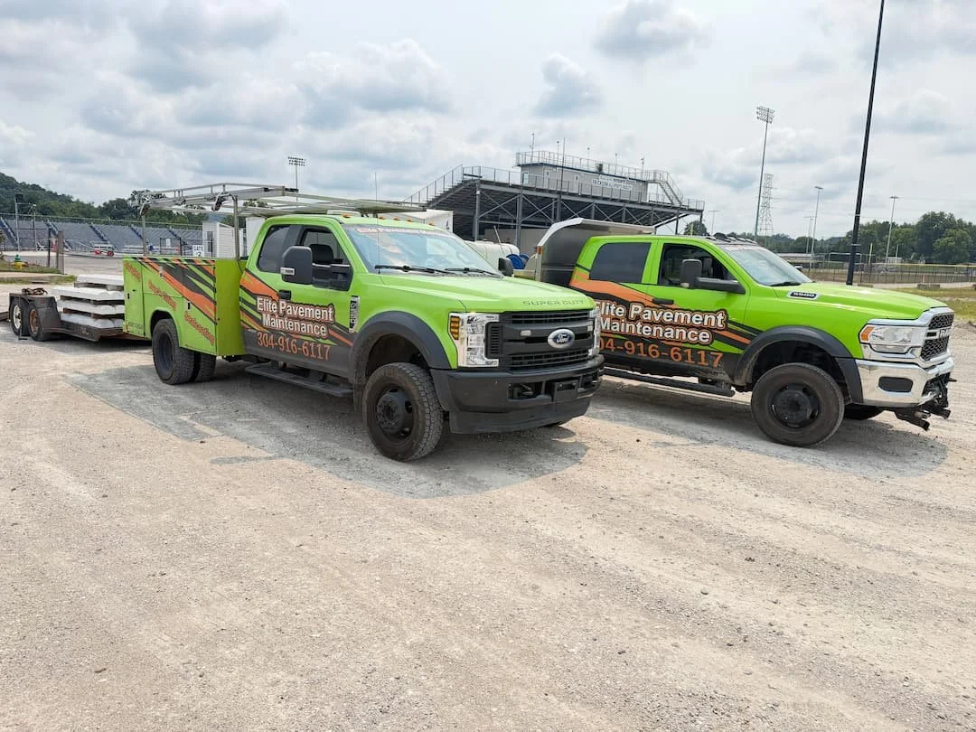 Owner Brandon Parsons of Elite Pavement Maintenance overseeing a commercial asphalt maintenance project in Parkersburg WV.