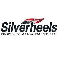 Silverheels Property Management LLC logo with stylized wing design