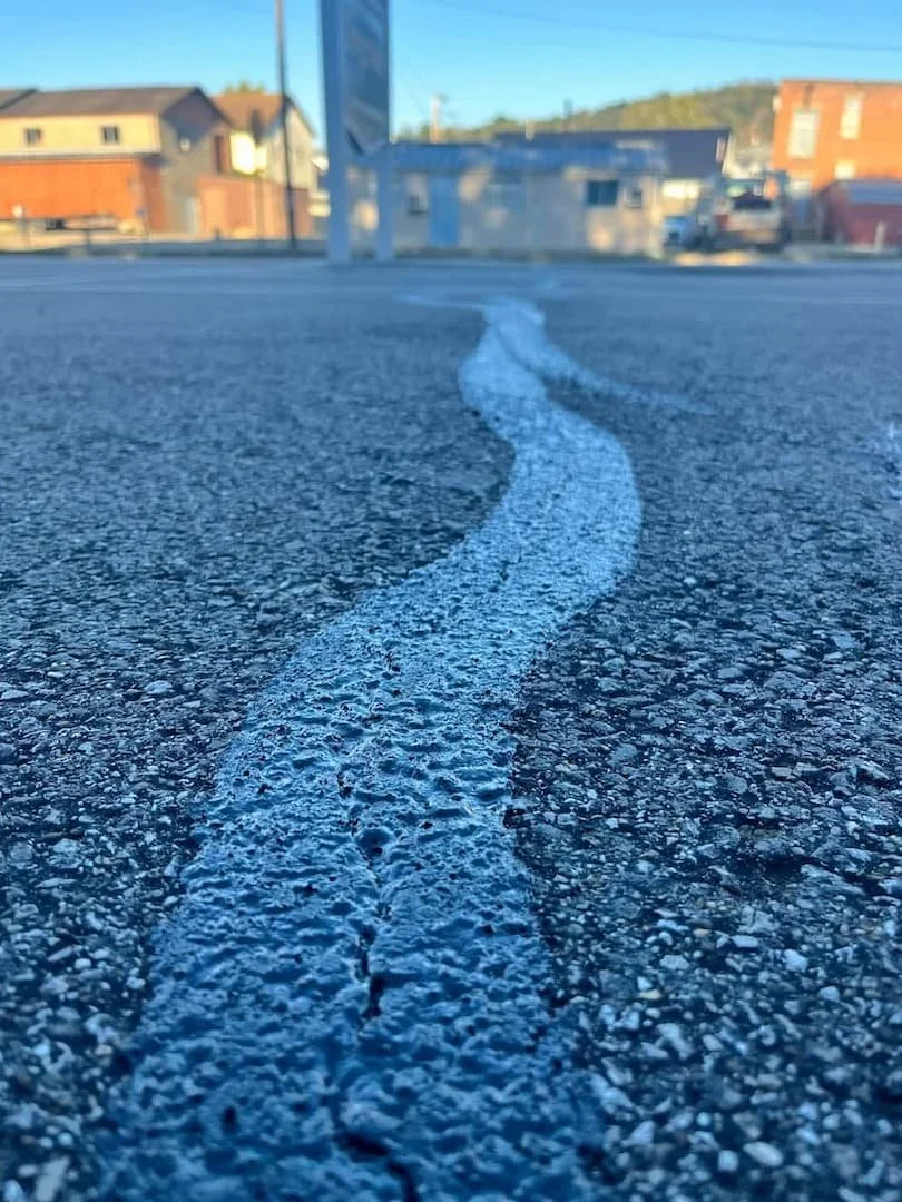 Commercial parking lot crack repair services in Parkersburg WV by Elite Pavement Maintenance.