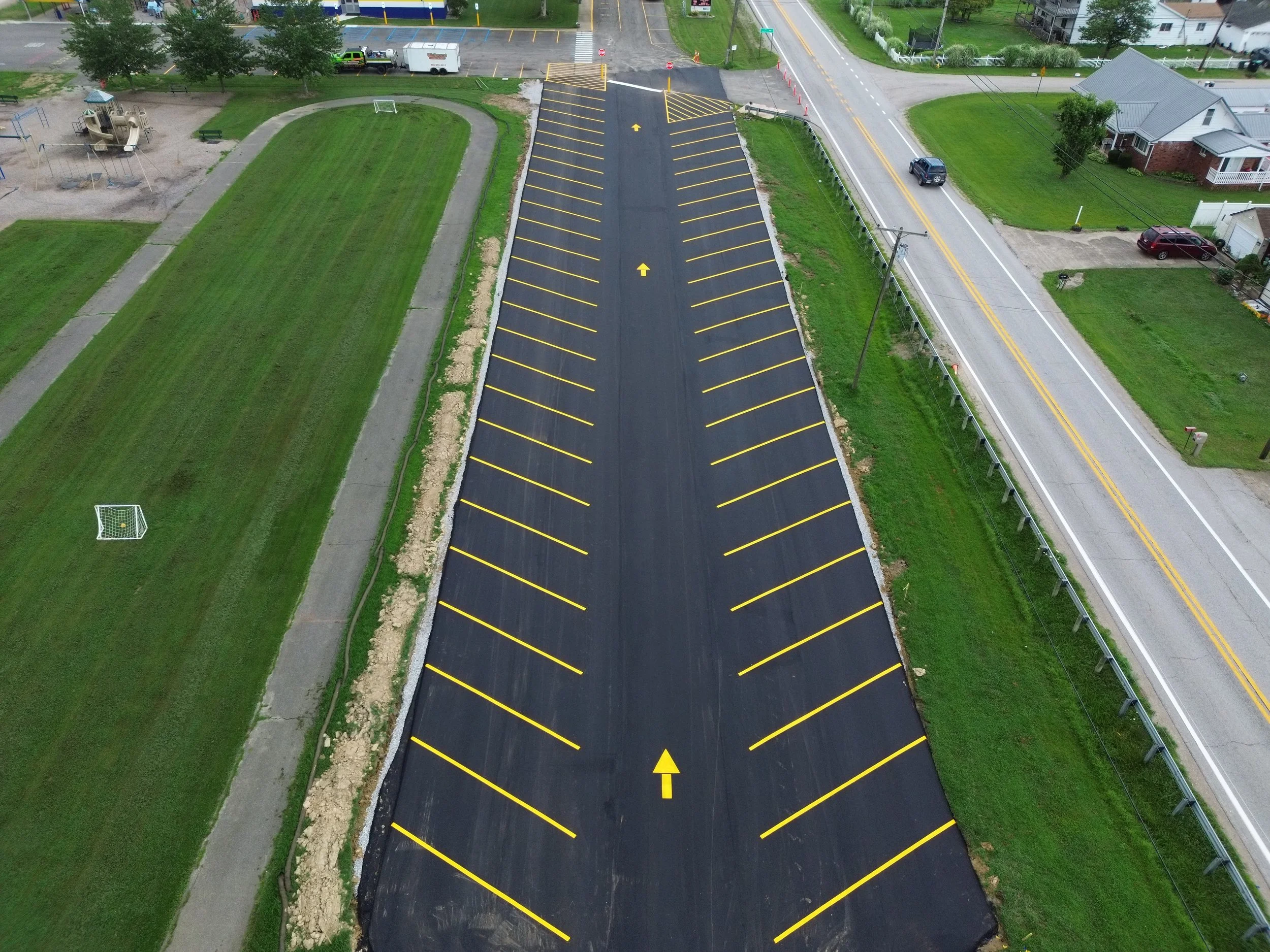 Fresh parking lot striping completed at Kanawha Elementary School in Davisville WV to improve traffic flow, safety, and parking organization.