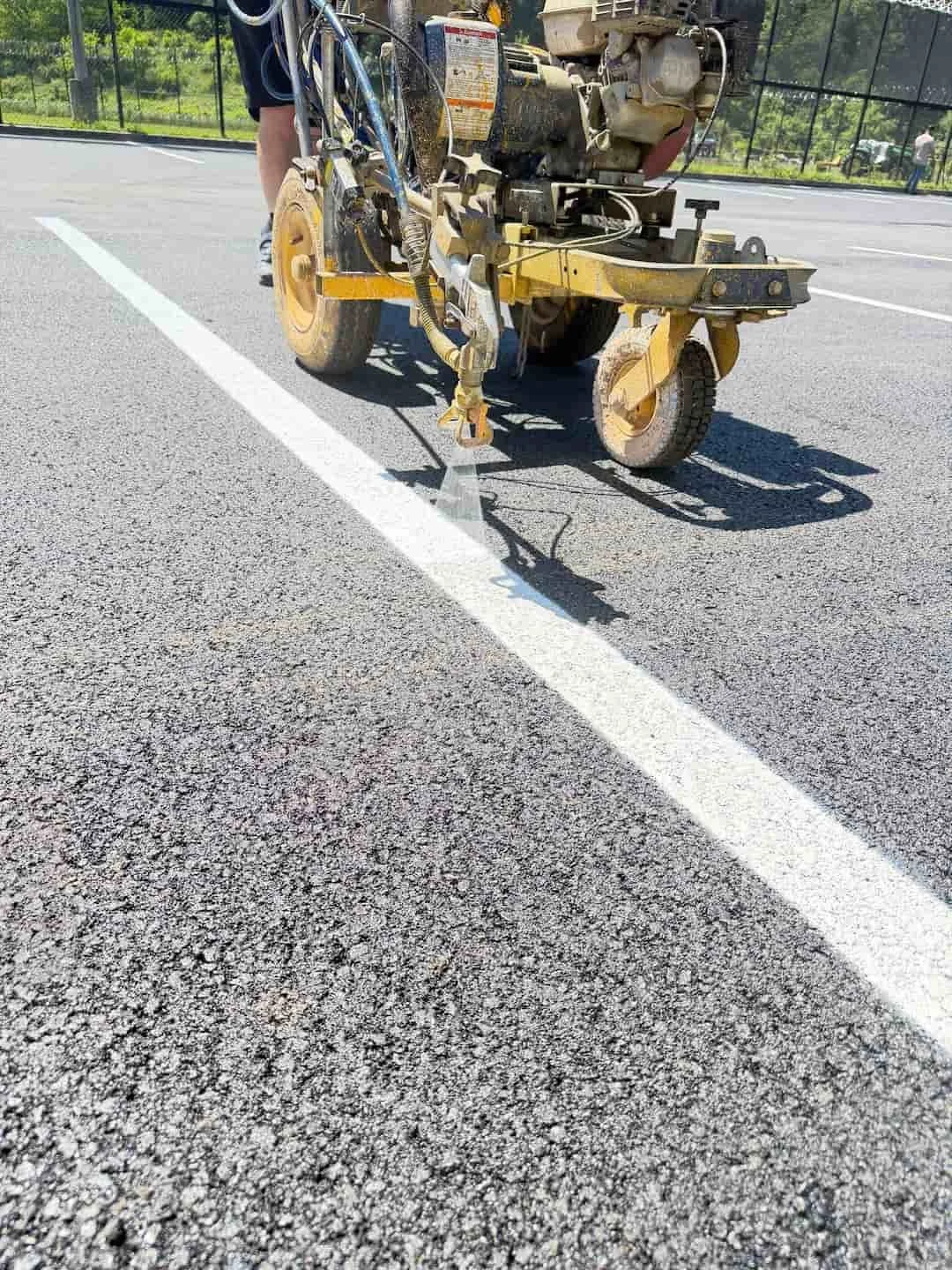 Completed parking lot striping project at North Central Regional Jail in Clarksburg WV with fresh parking lines and ADA markings.
