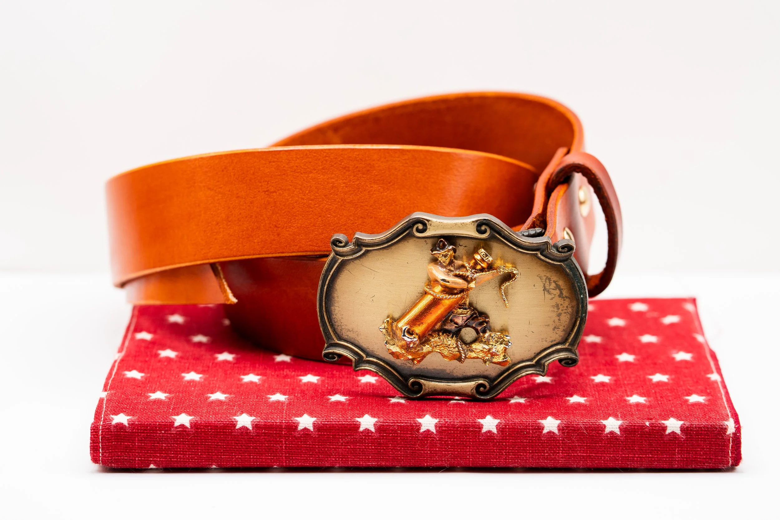 1970s Vintage Raintree Cowboy Wrangling a Beer Bottle Belt Buckle w/ RLC "Caballero" belt in Cognac brown