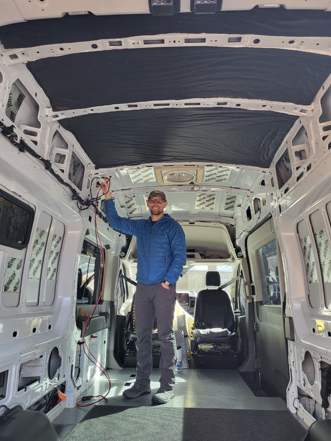 Electrician installing electrical wiring inside a camper van in South Lake Tahoe