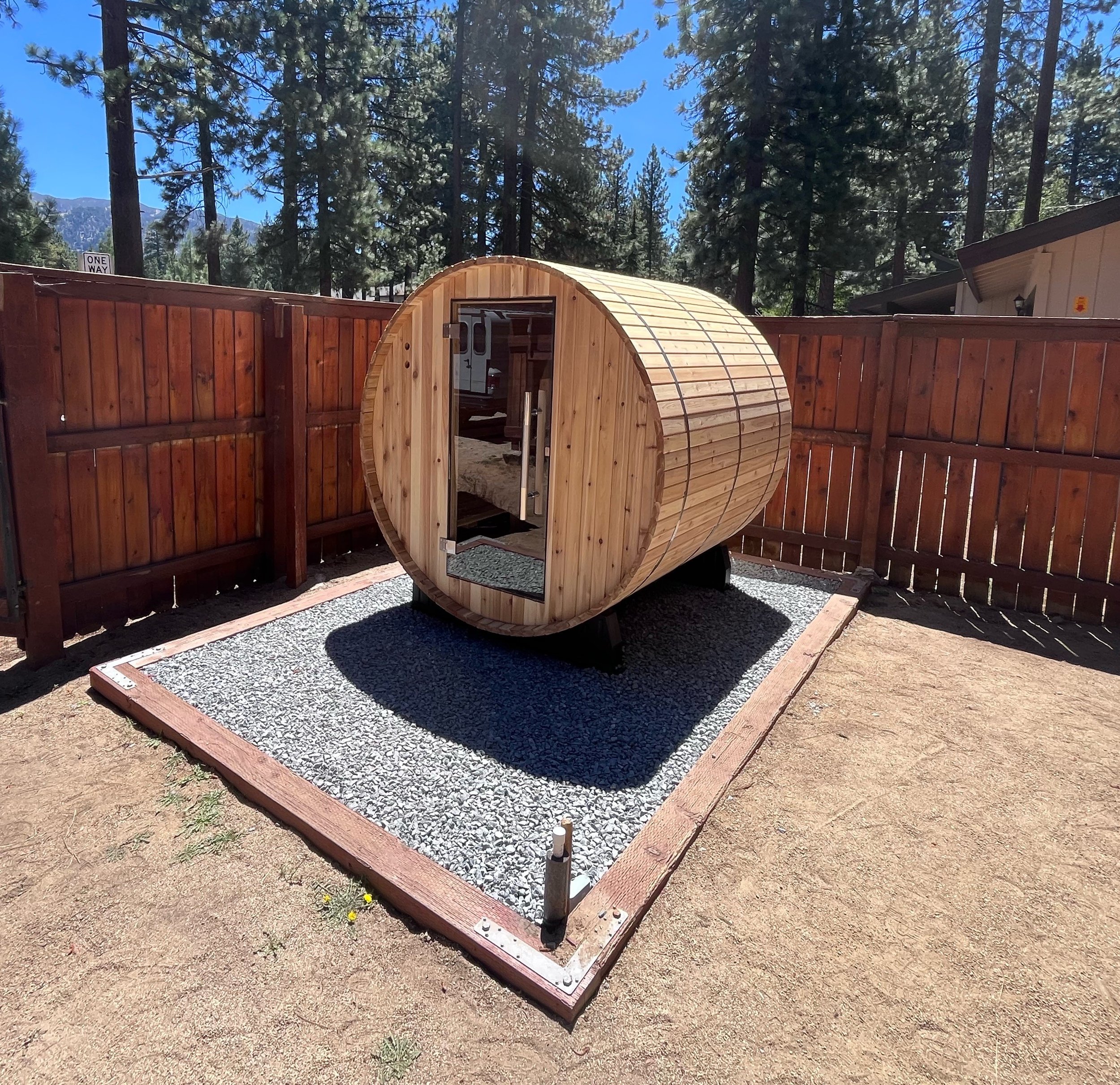 Outdoor barrel sauna with dedicated electrical circuit installation