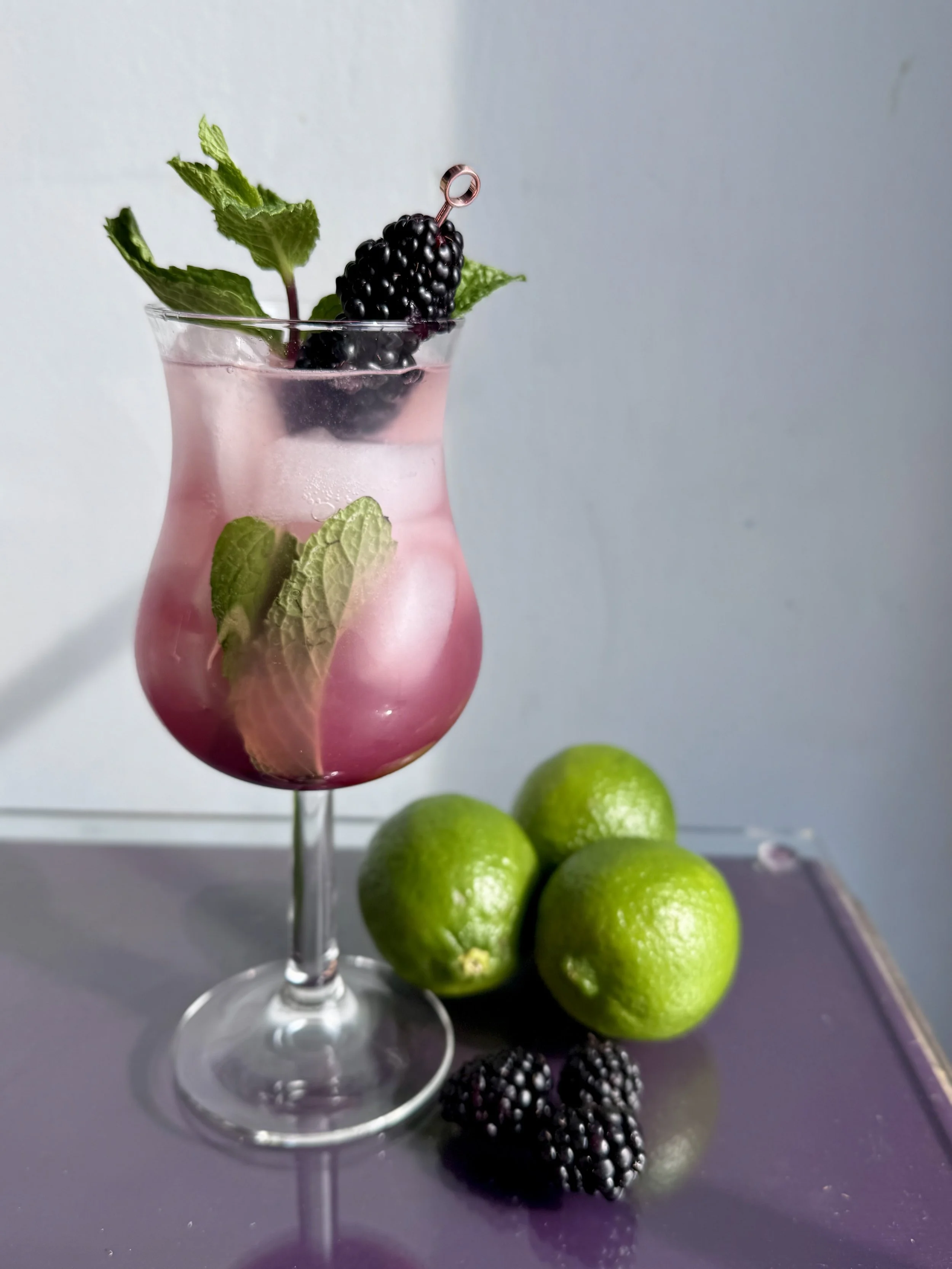 mocktail in elegant glass with mint and lime