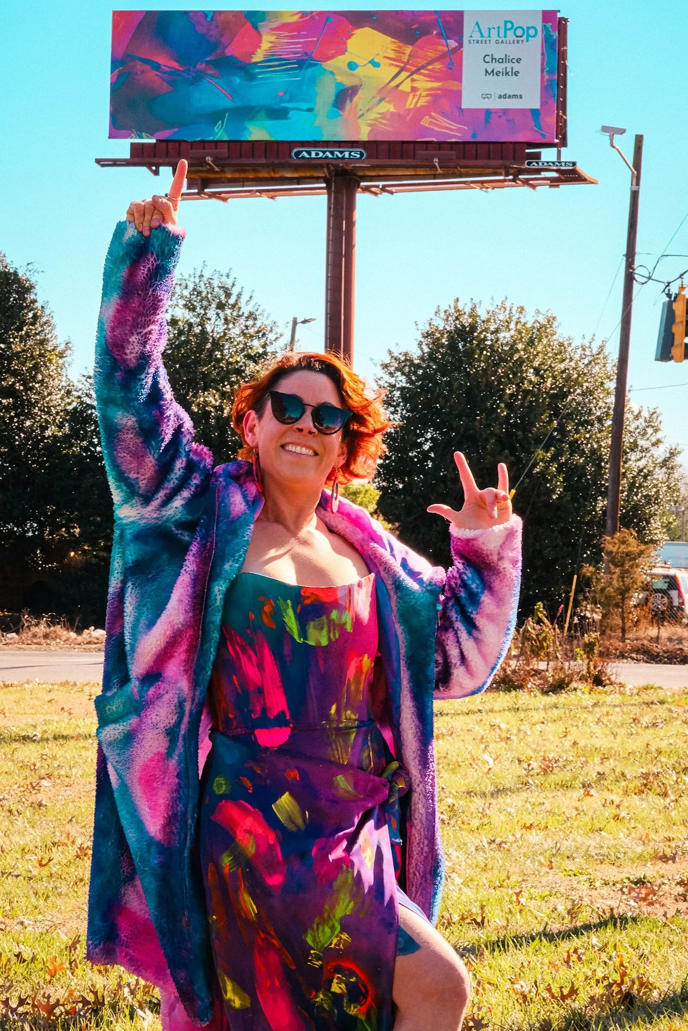 Little photoshoot with photographer Eric Pratt. Hand-painted dress with ArtPop billboard in the back.  