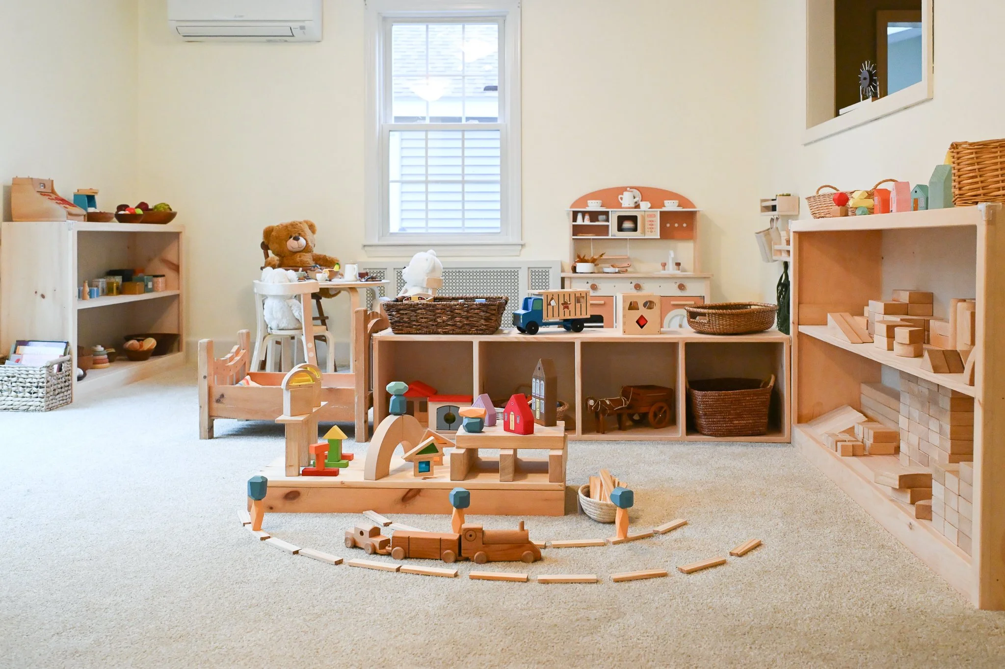 Well-lit classroom with multiple toys
