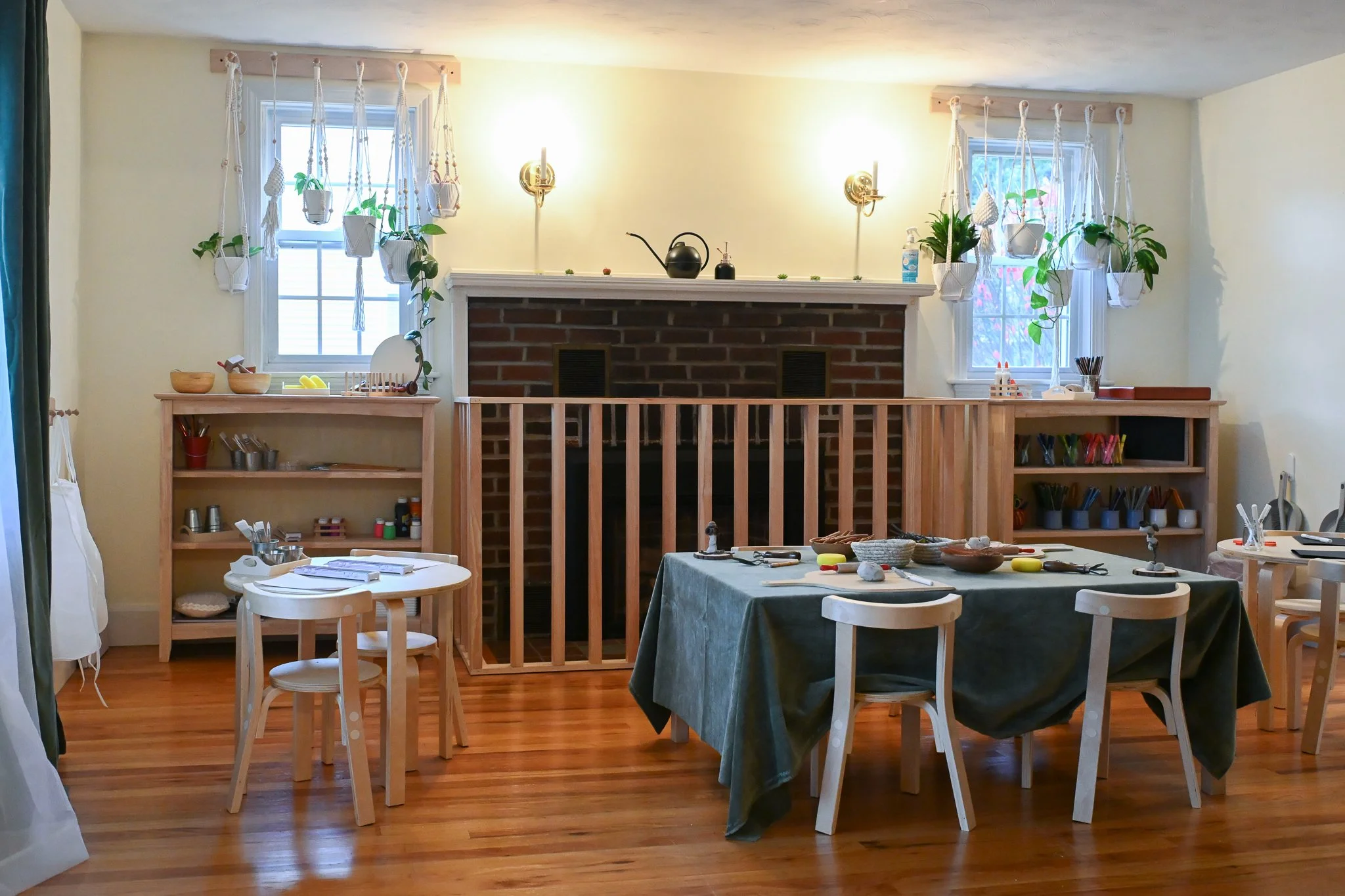 Clean, organized classroom with tables and chairs set up for learning.