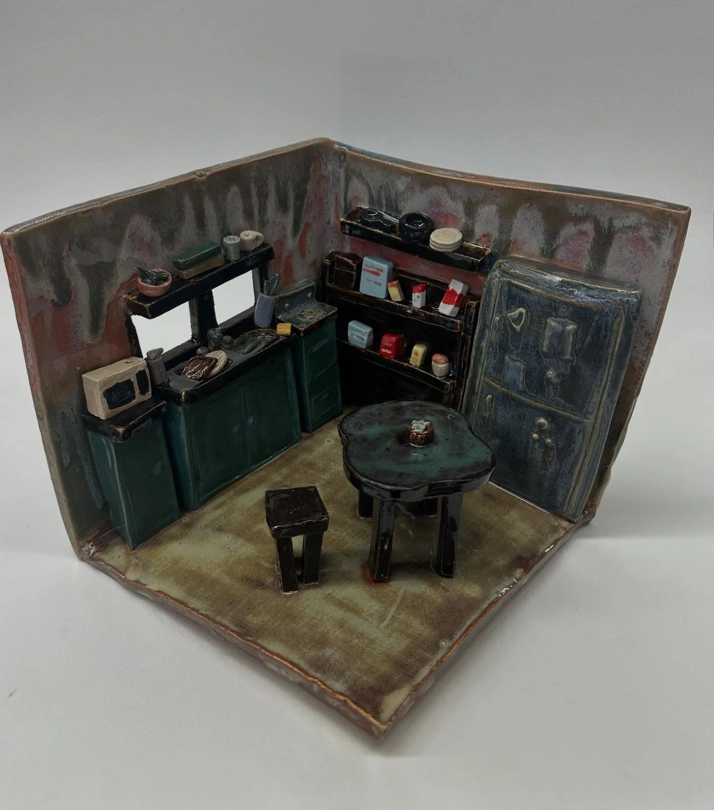 This lovely kitchen made it through the firing! 🍳