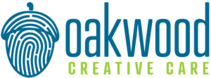 Logo for Oakwood Creative Care with a blue fingerprint icon and text in blue and green.