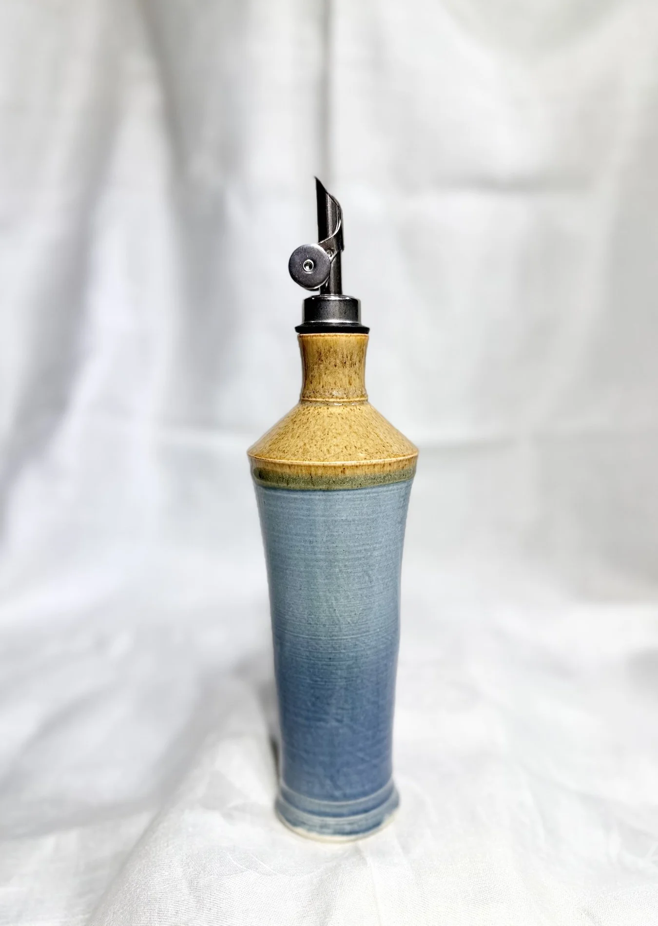 U883.Oil Bottle.LB_8.5Hx2.75WL.jpeg