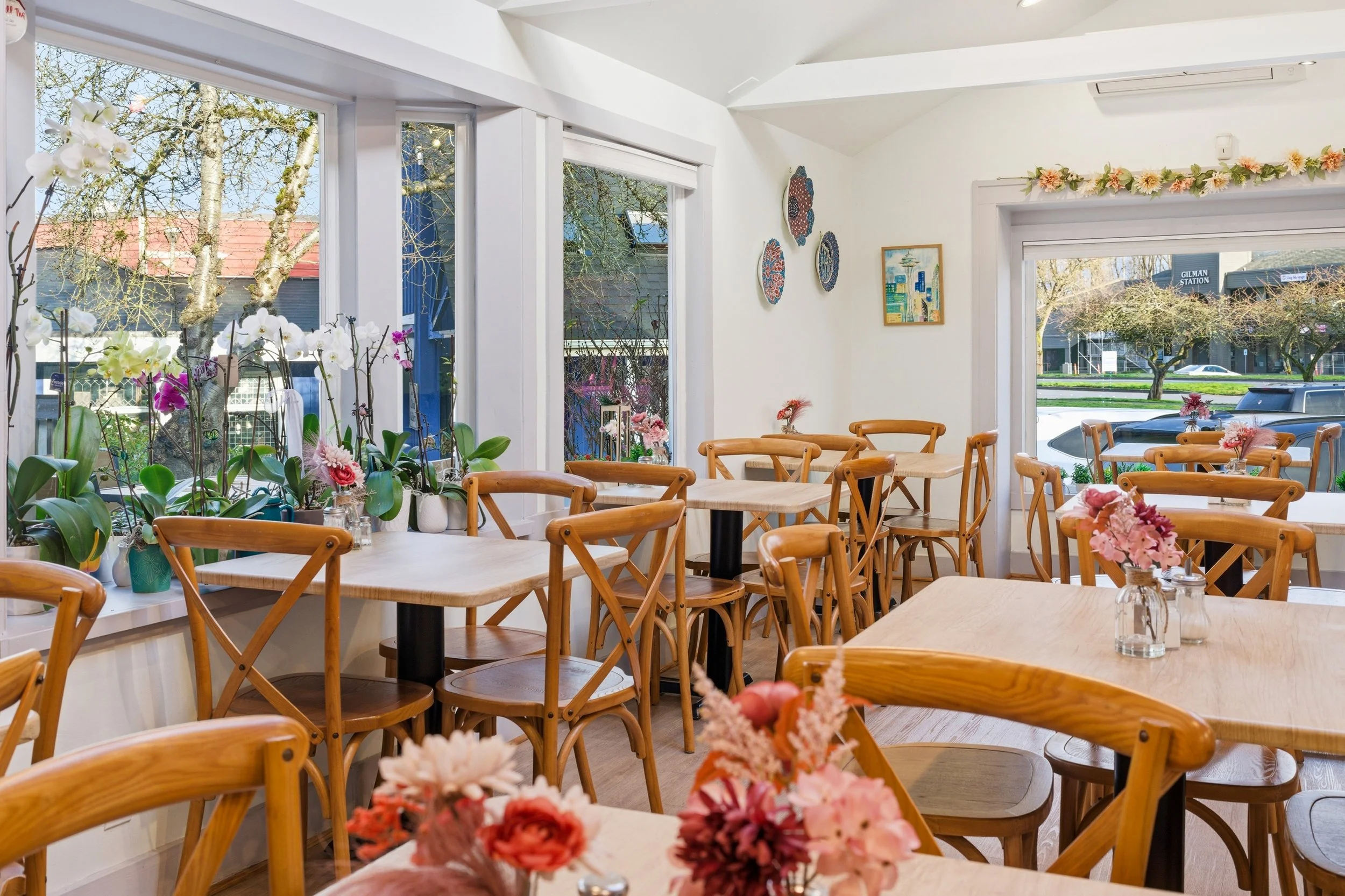 Interior of Bernas Bakery and Cafe - cozy coffee shop and restaurant in Issaquah with wooden tables