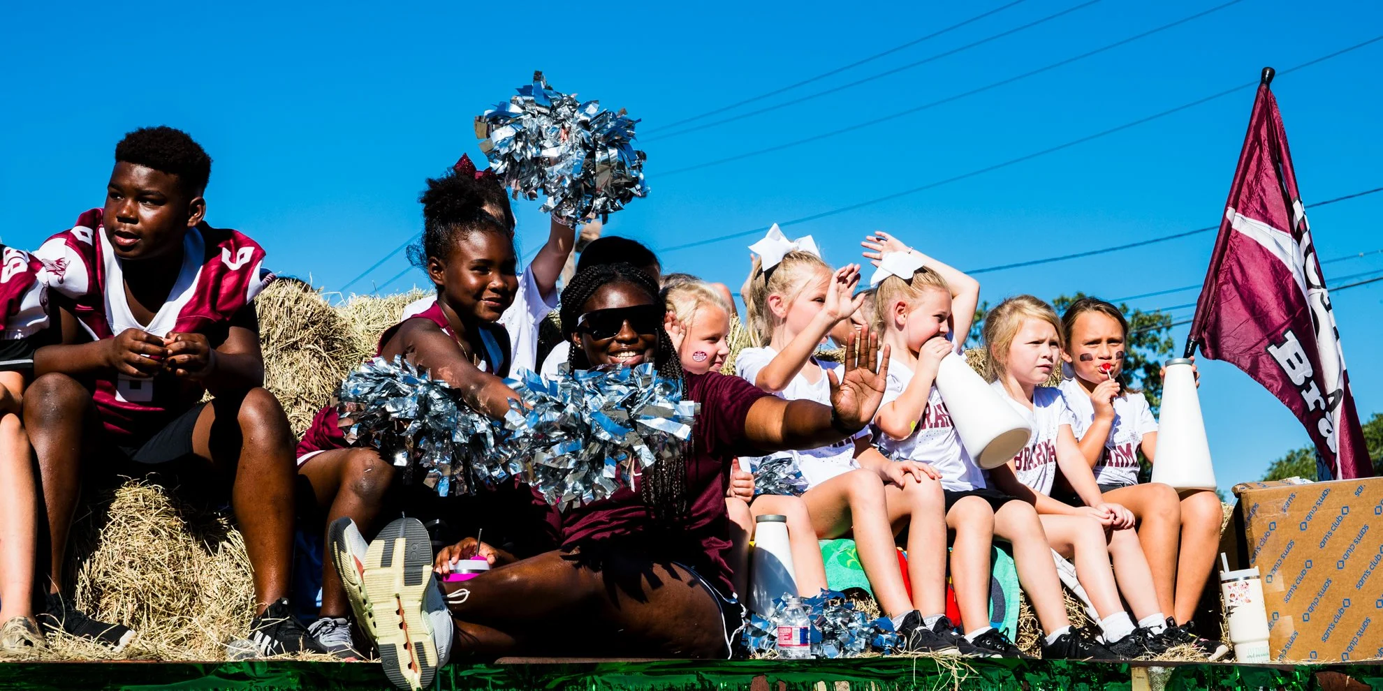 Hallettsville Football boosters at the Kolache Fest parade