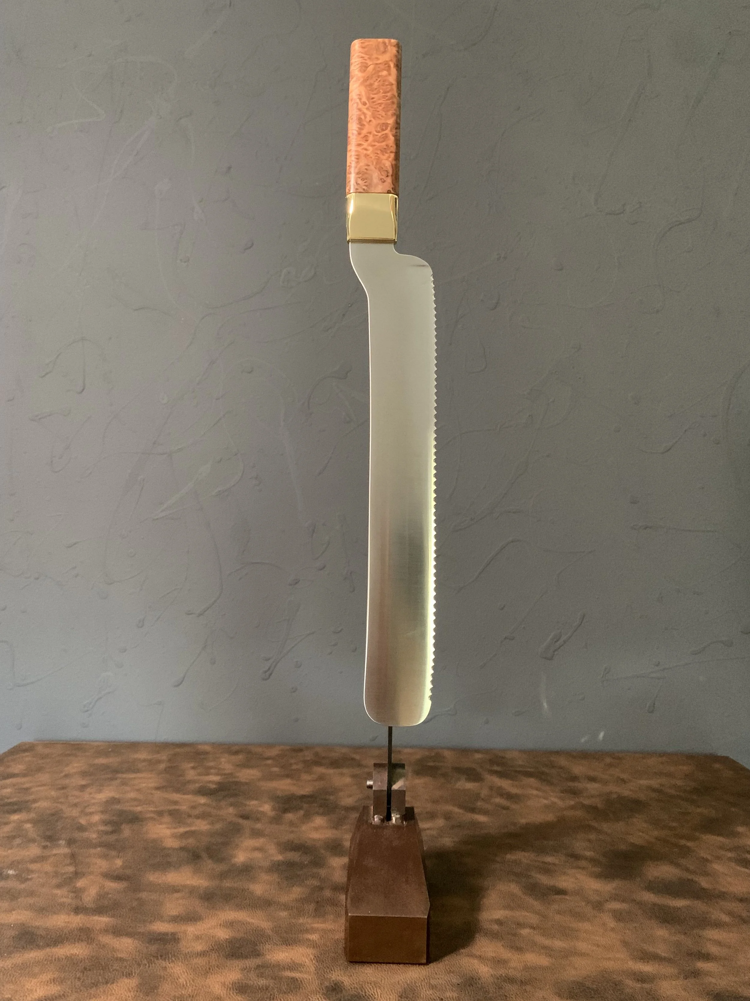 Stainless bread knife with mallee burl handle