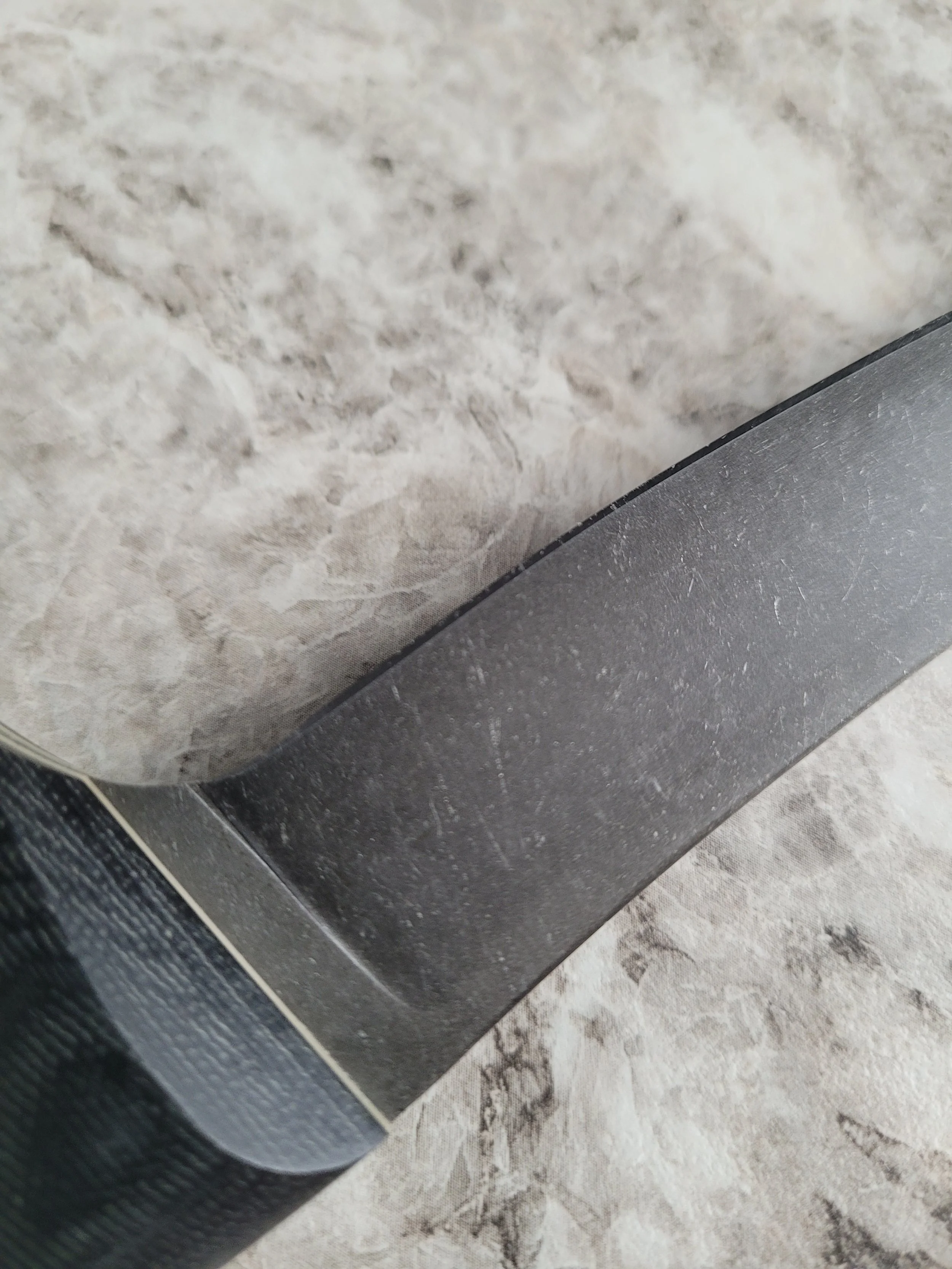 Etched and stonewashed blade.