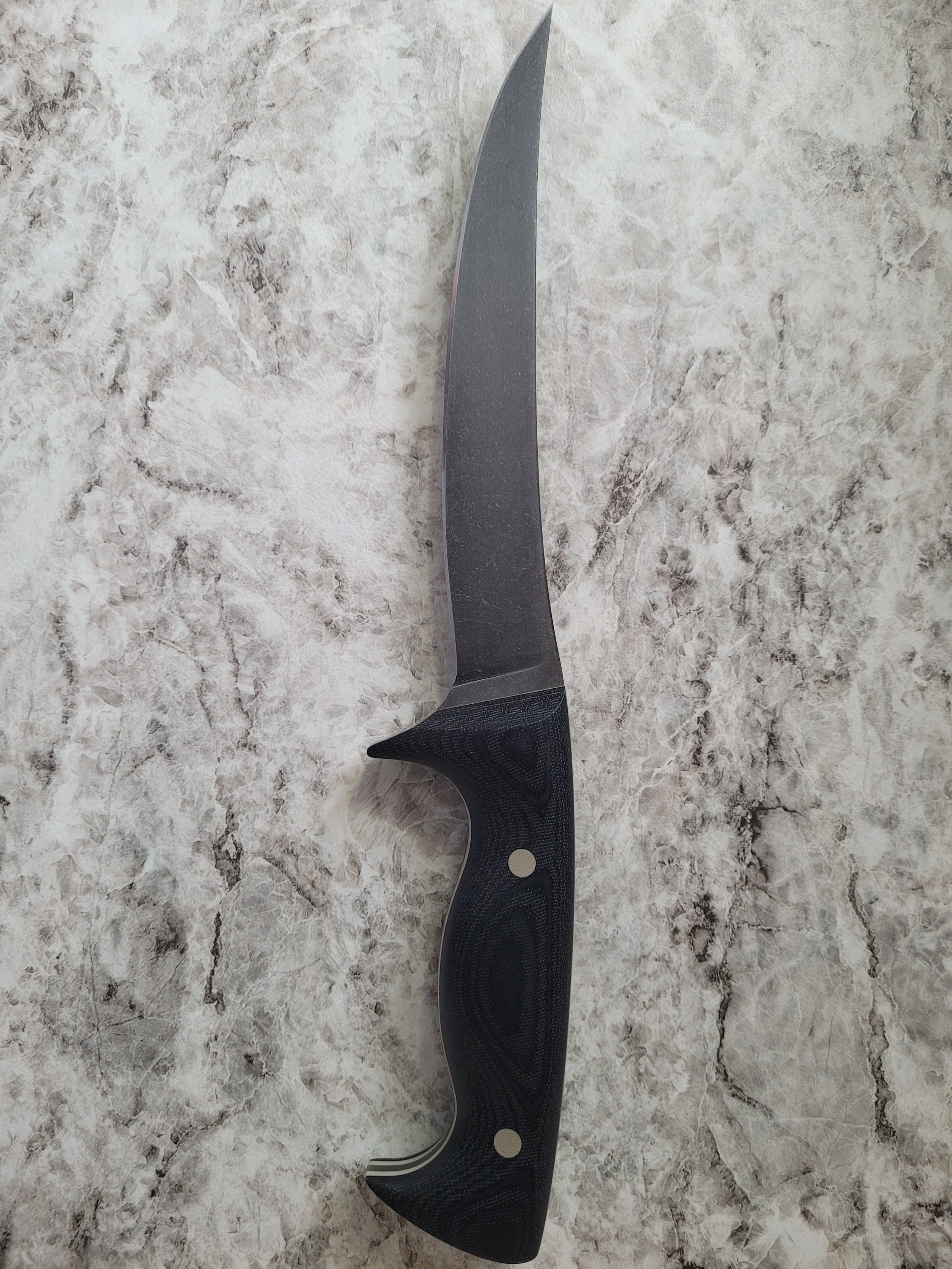 Carbon steel fillet/boning knife.