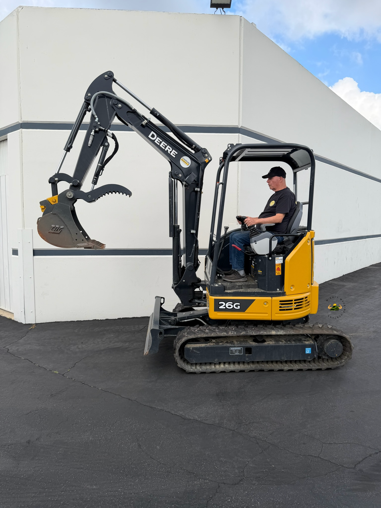 The Tight-Space Titan: Why the 2021 John Deere 26G is a Jobsite Essential