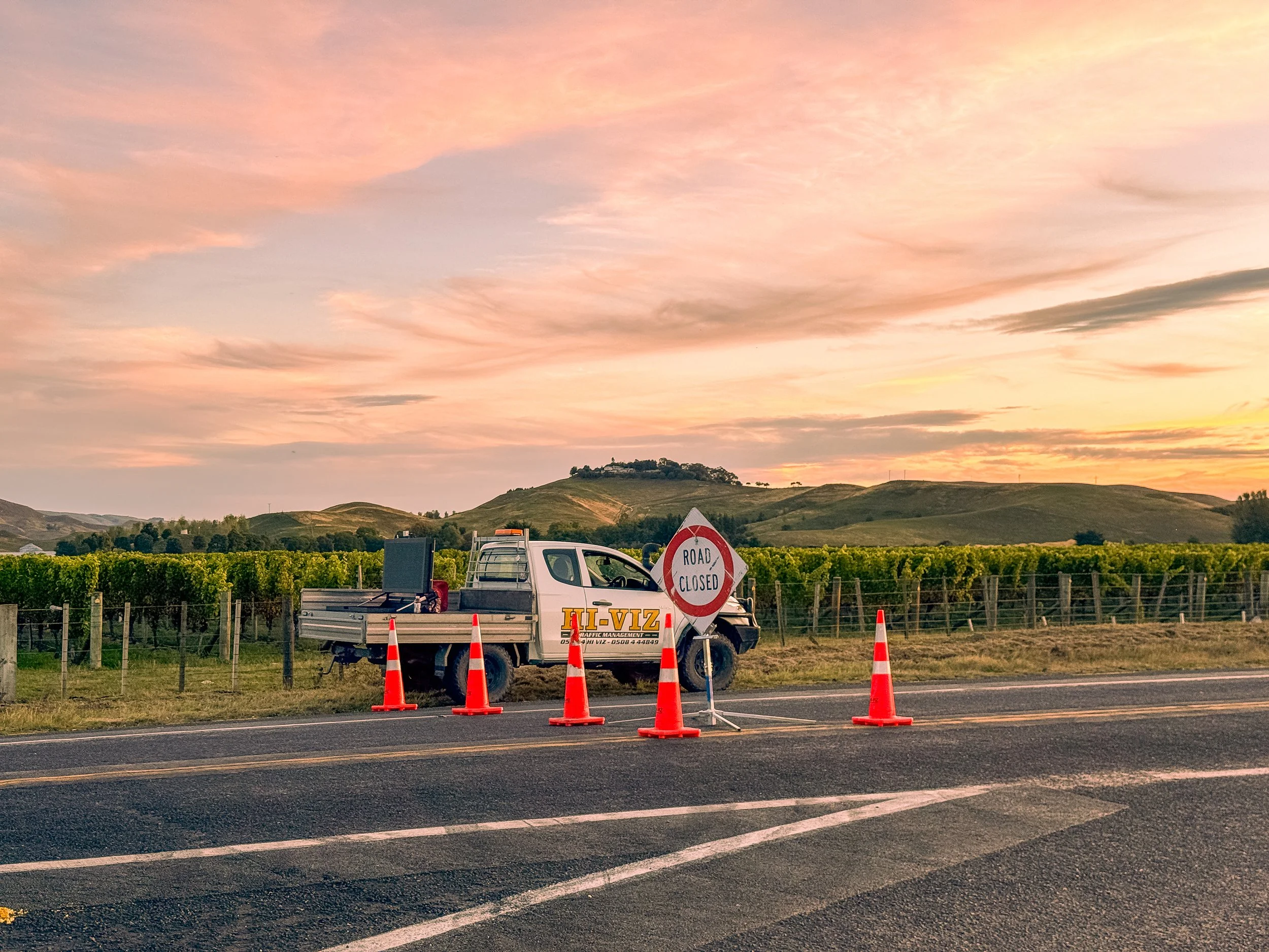 A picture of a Hi-Viz TTM ute operating a road closure