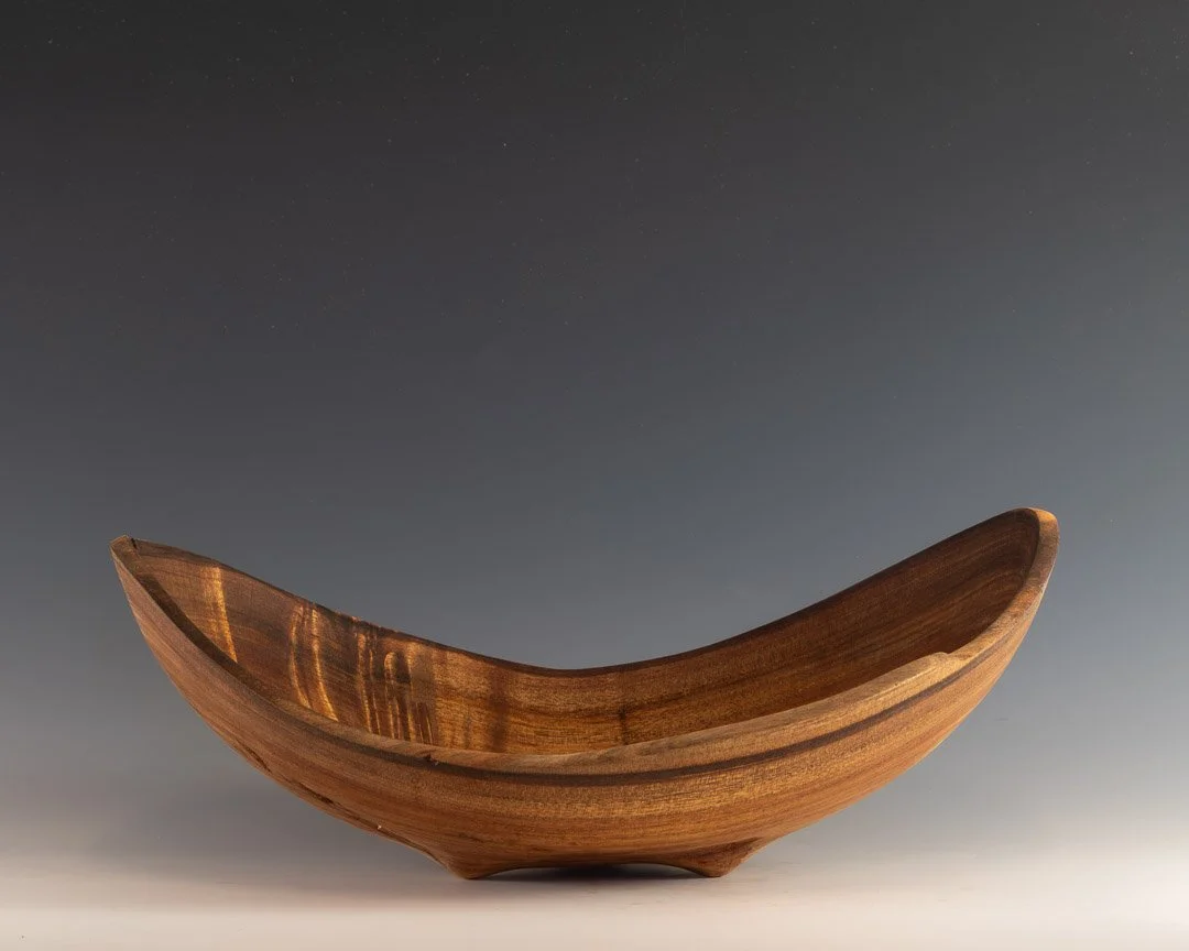 Koa bowl with carved feet