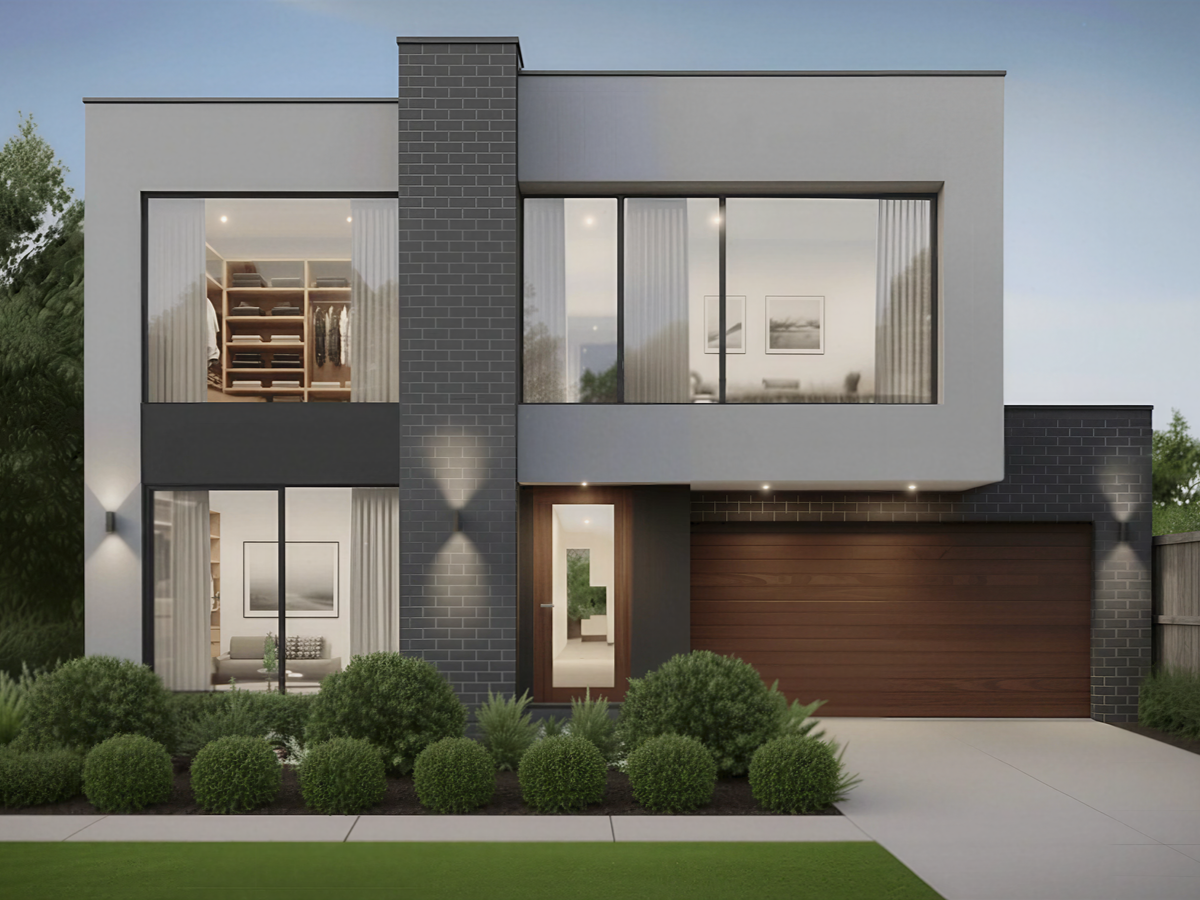 A small white house with a gray metal roof, black front door, bordered by a white picket fence, with a sidewalk leading to the entrance, green bushes and plants in the garden, and neighboring houses on either side.