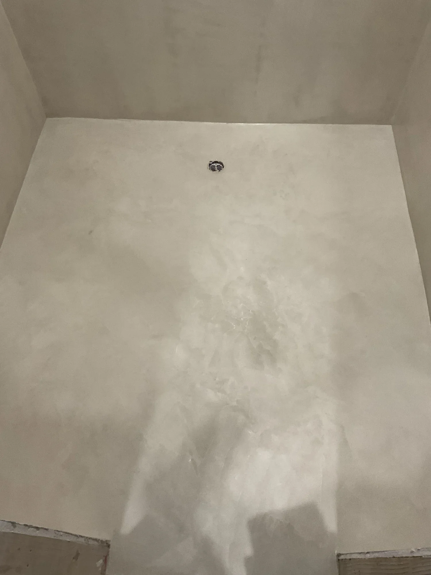 waterproof-microcement-shower-floor-pan.webp
