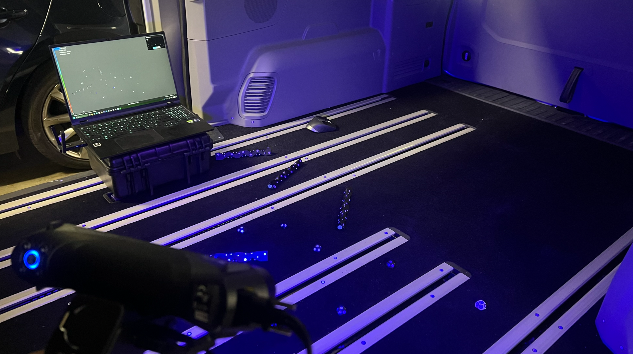 Ford Tourneo vehicle floor with seat tracks showing areas requiring custom floor mat design