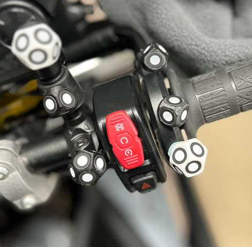 Motorcycle handlebar prepared for 3D scanning with positioning targets applied for accurate data capture