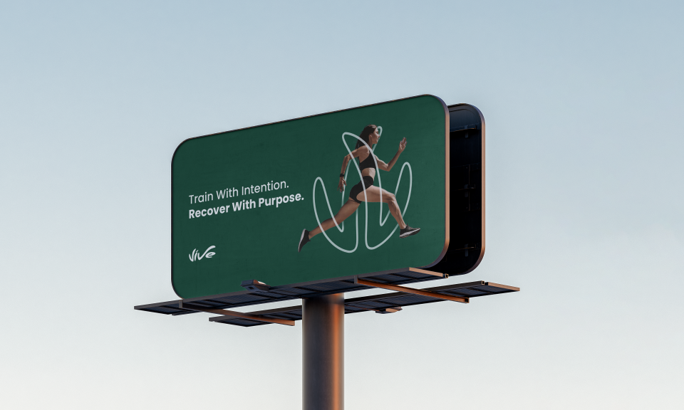 Outdoor billboard featuring a woman running and the motivational text, "Train With Intention. Recover With Purpose."