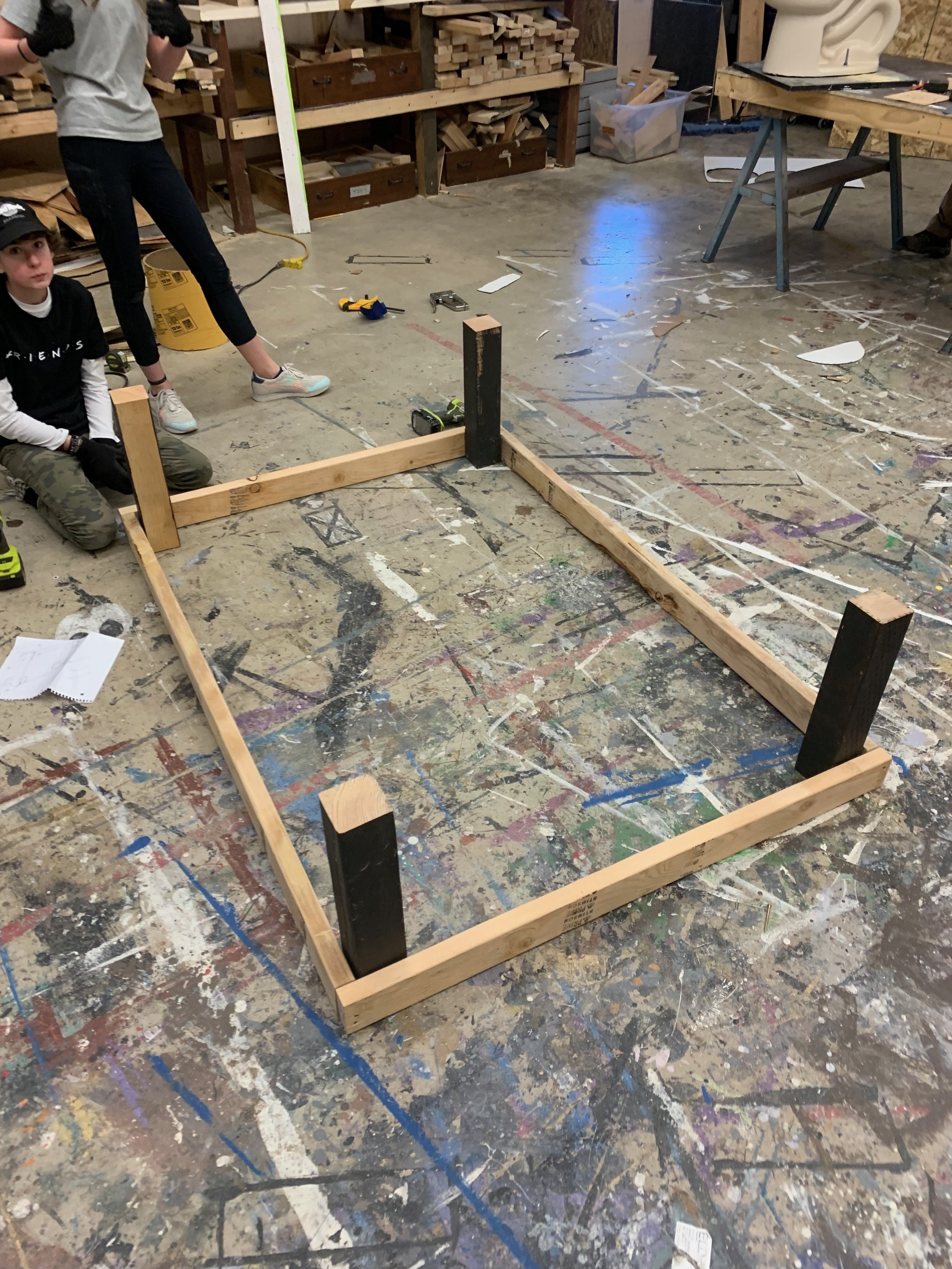 Reagan and I building the bed