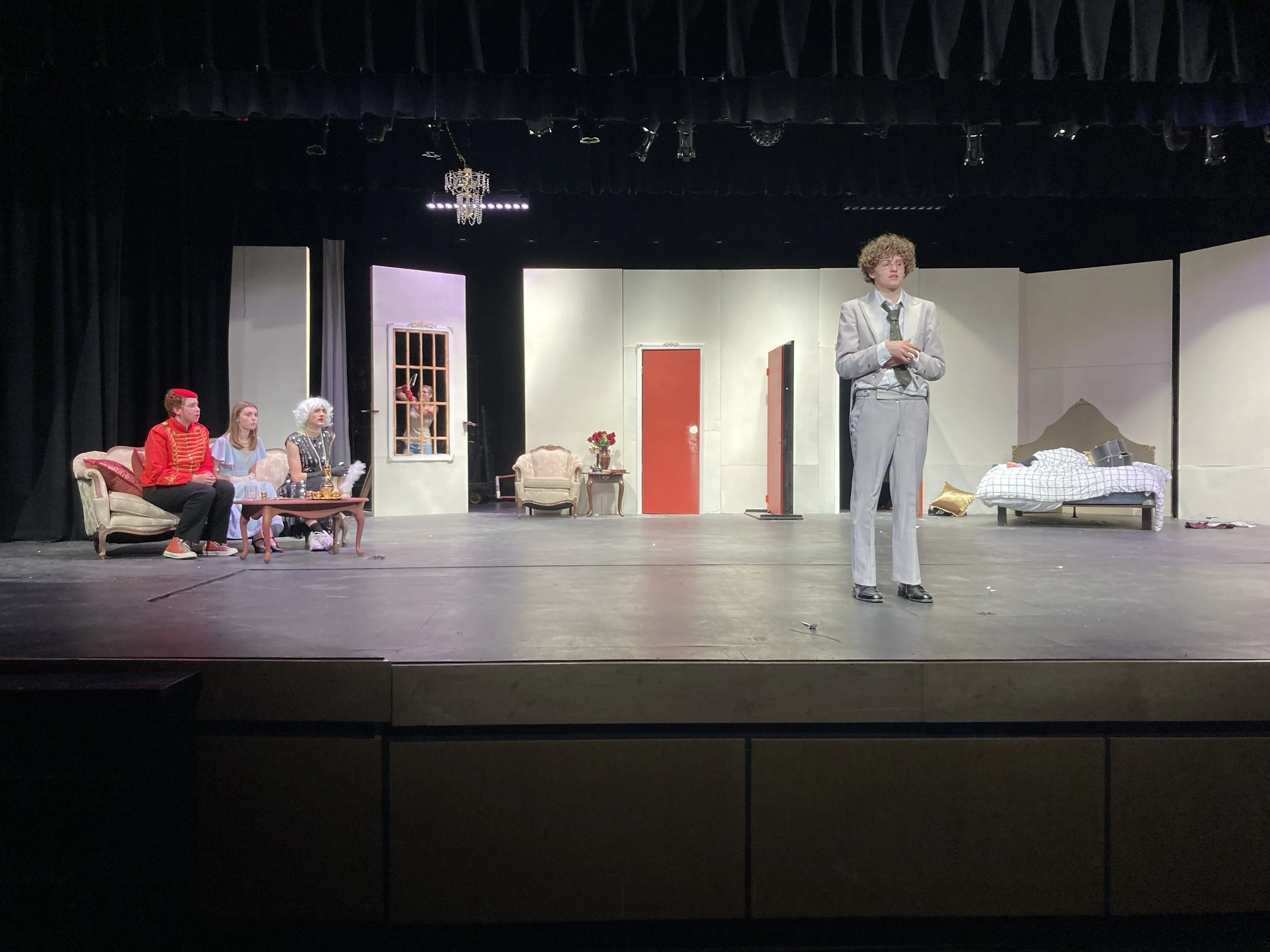 Bellhop, Maggie, Julia, and Saunders