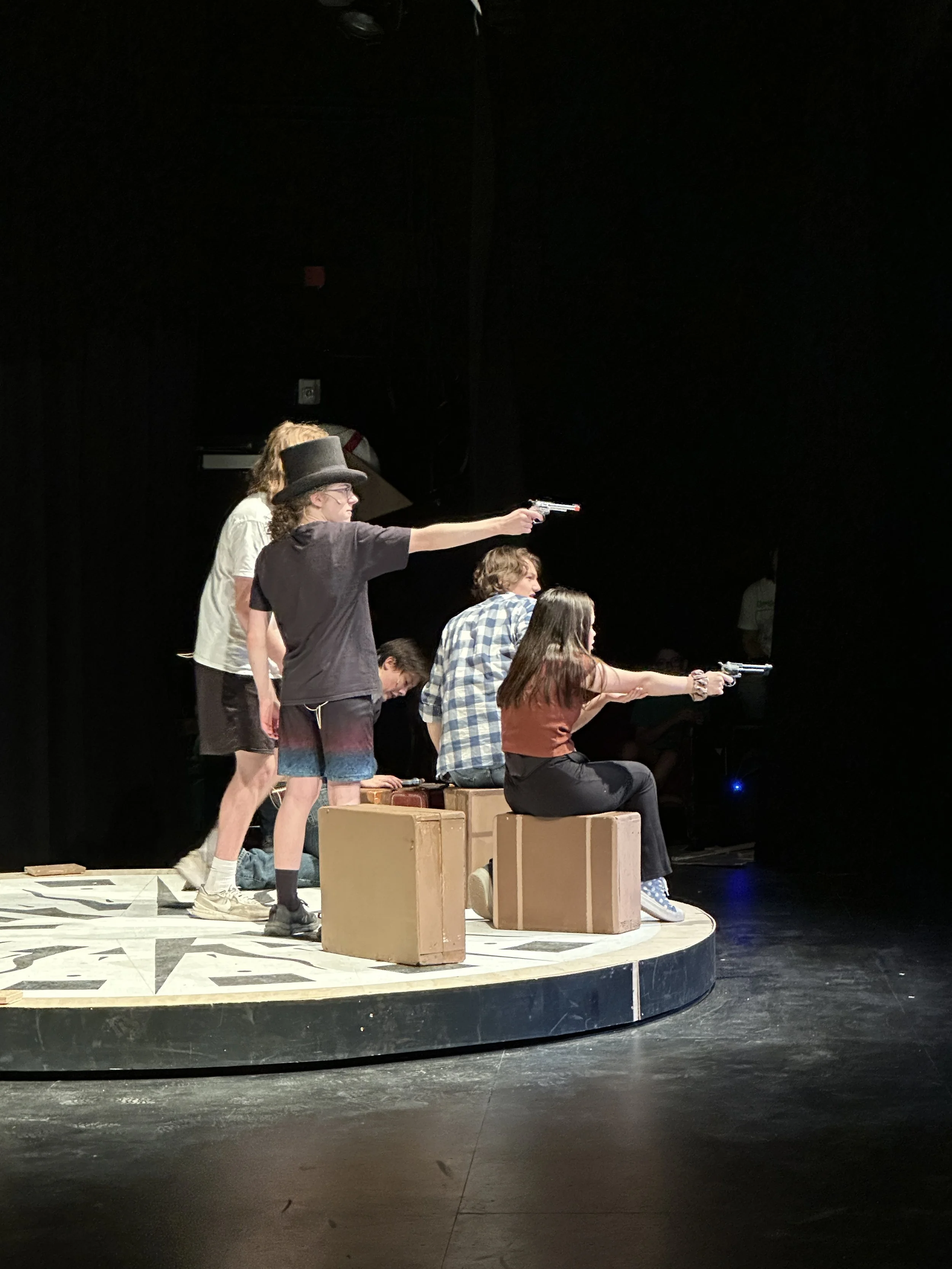 Rehearsal with suitcases and revolve