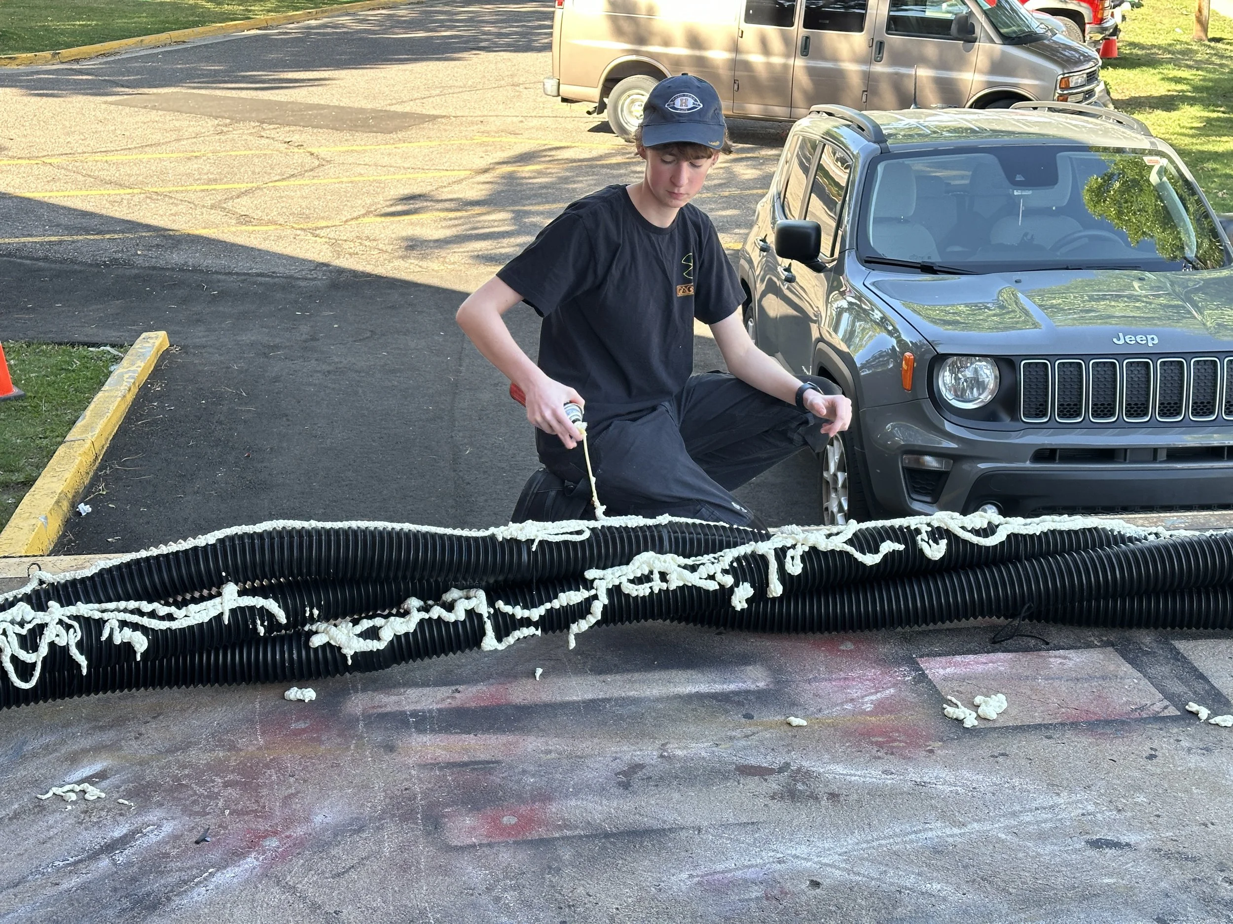 Using spray foam to make the tube trees textured like bark