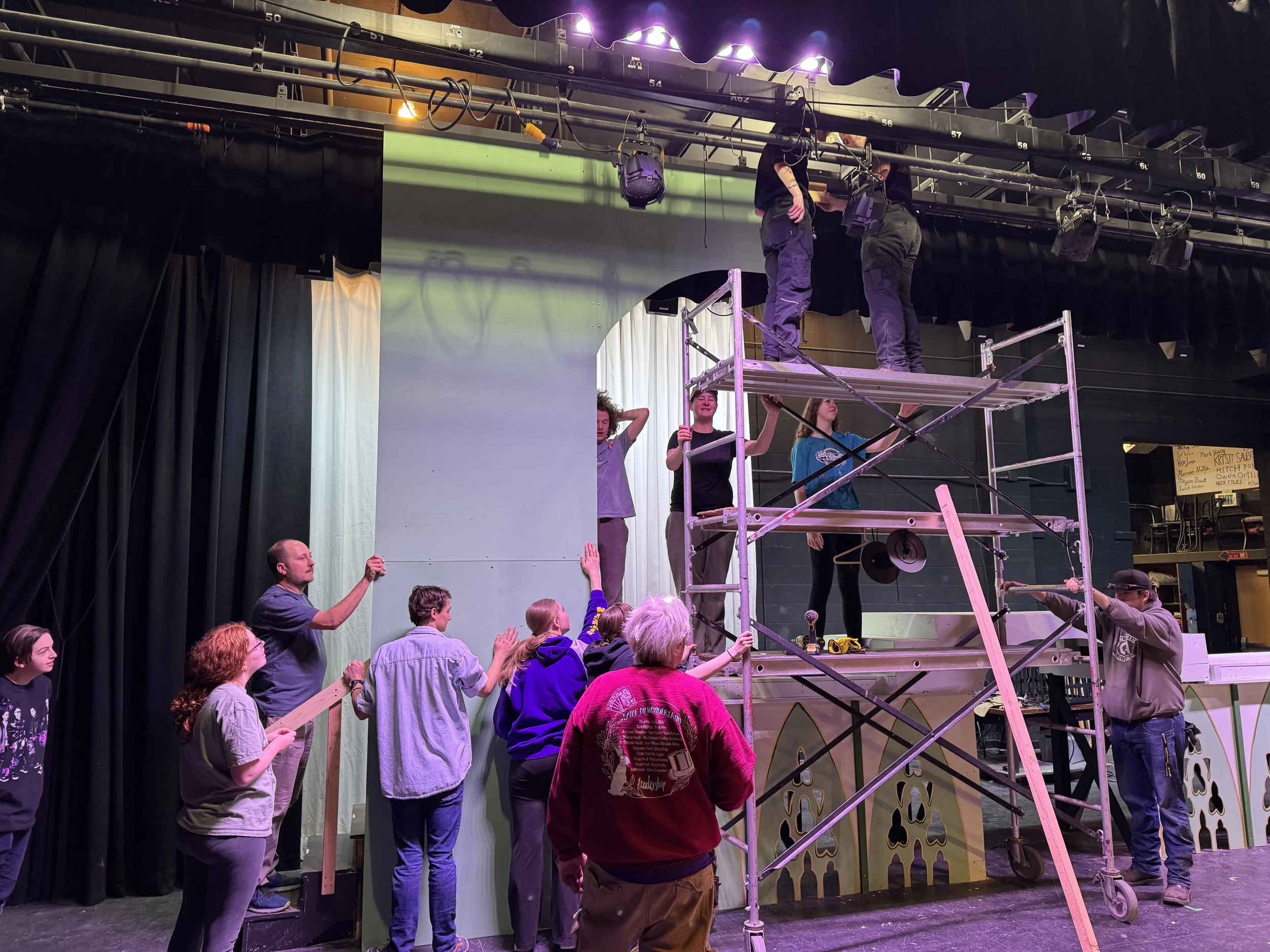 Construction Crew putting up the Proscenium Arch