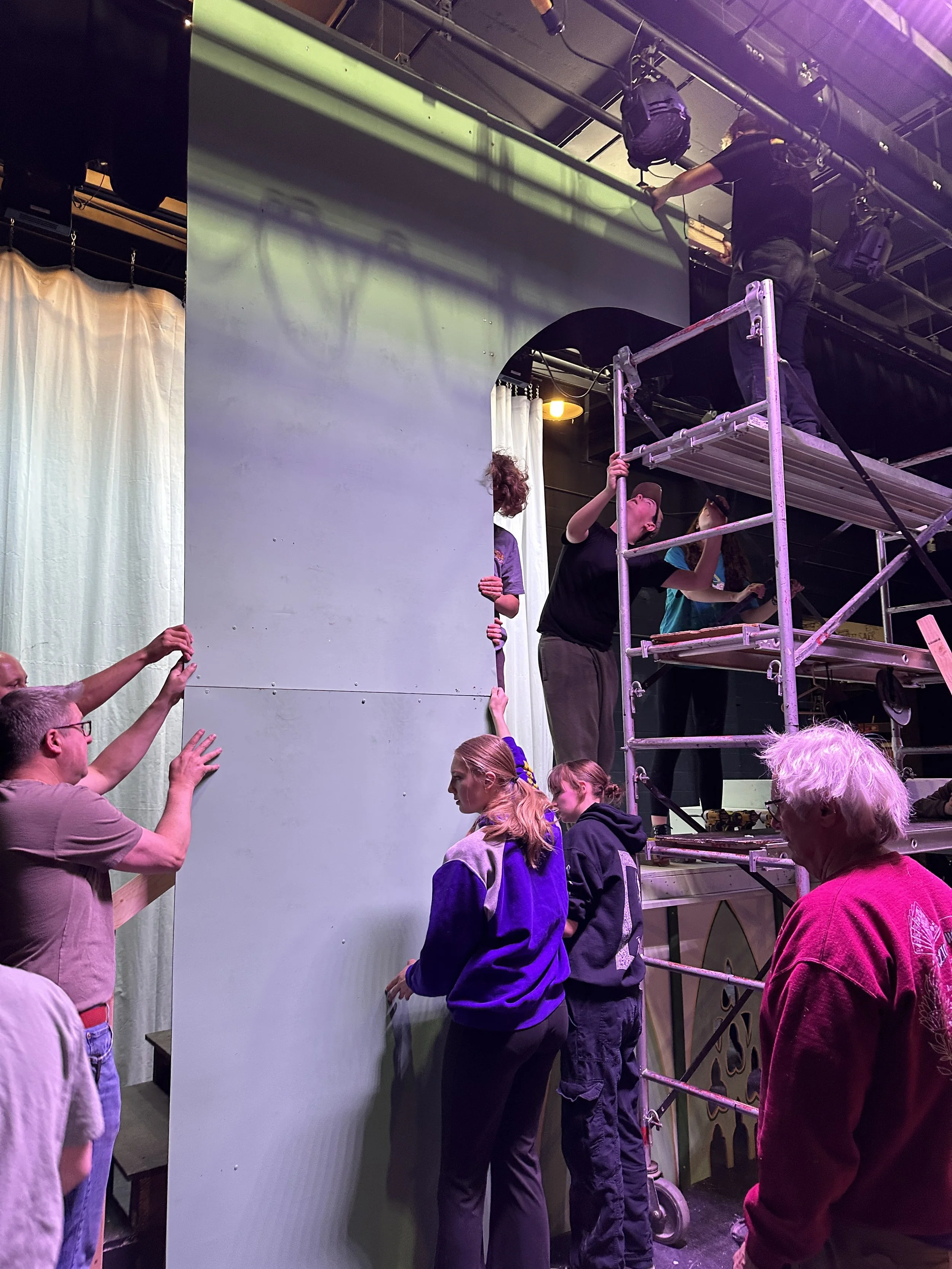 Construction Crew putting up the Proscenium Arch