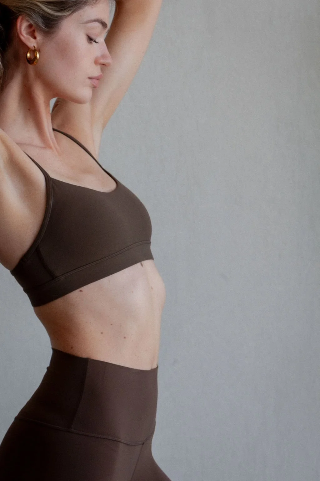 Beautiful girl pilates stretching