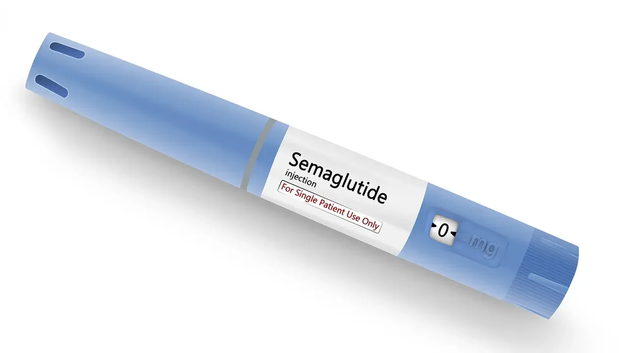 A medical syringe labeled 'Semaglutide' for single patient use, with a blue plunger and clear barrel.