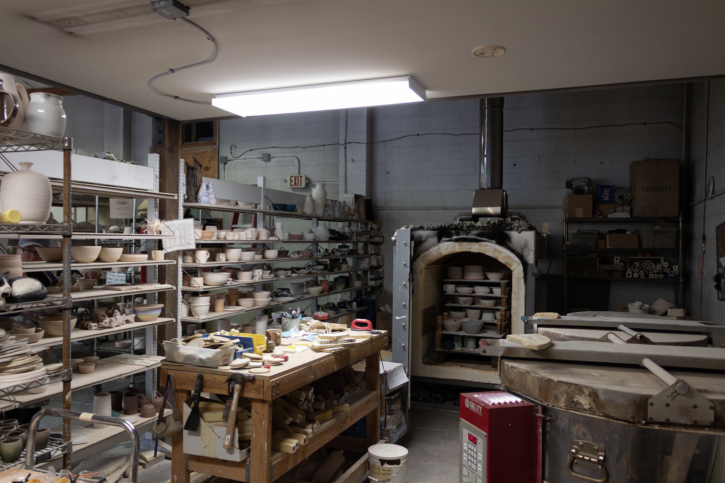 A gas-powered kiln sits in the back corner of The Wedge Studio in Reno, Nev., surrounded by shelves of unfinished pottery waiting to be fired or painted, on Saturday, Nov. 15, 2025. Photo by Amanda Avilla