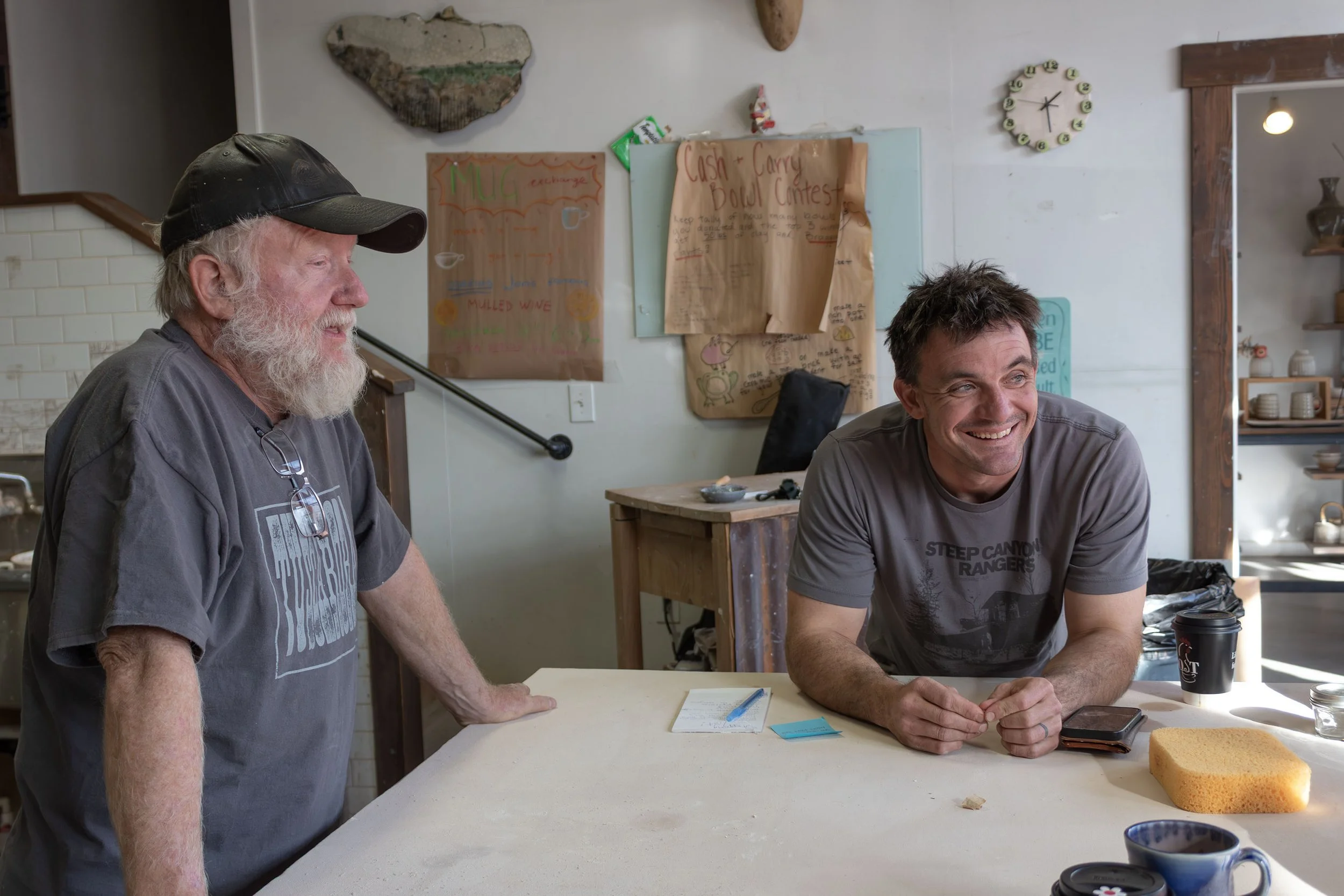 John, left, a longtime member of The Wedge Studio, talks with Stremmel, right, as the studio prepares for its annual Chili Night fundraiser in Reno, Nev., on Sunday, Dec. 7, 2025. 
Money raised at the event goes toward equipment upgrades and costly m
