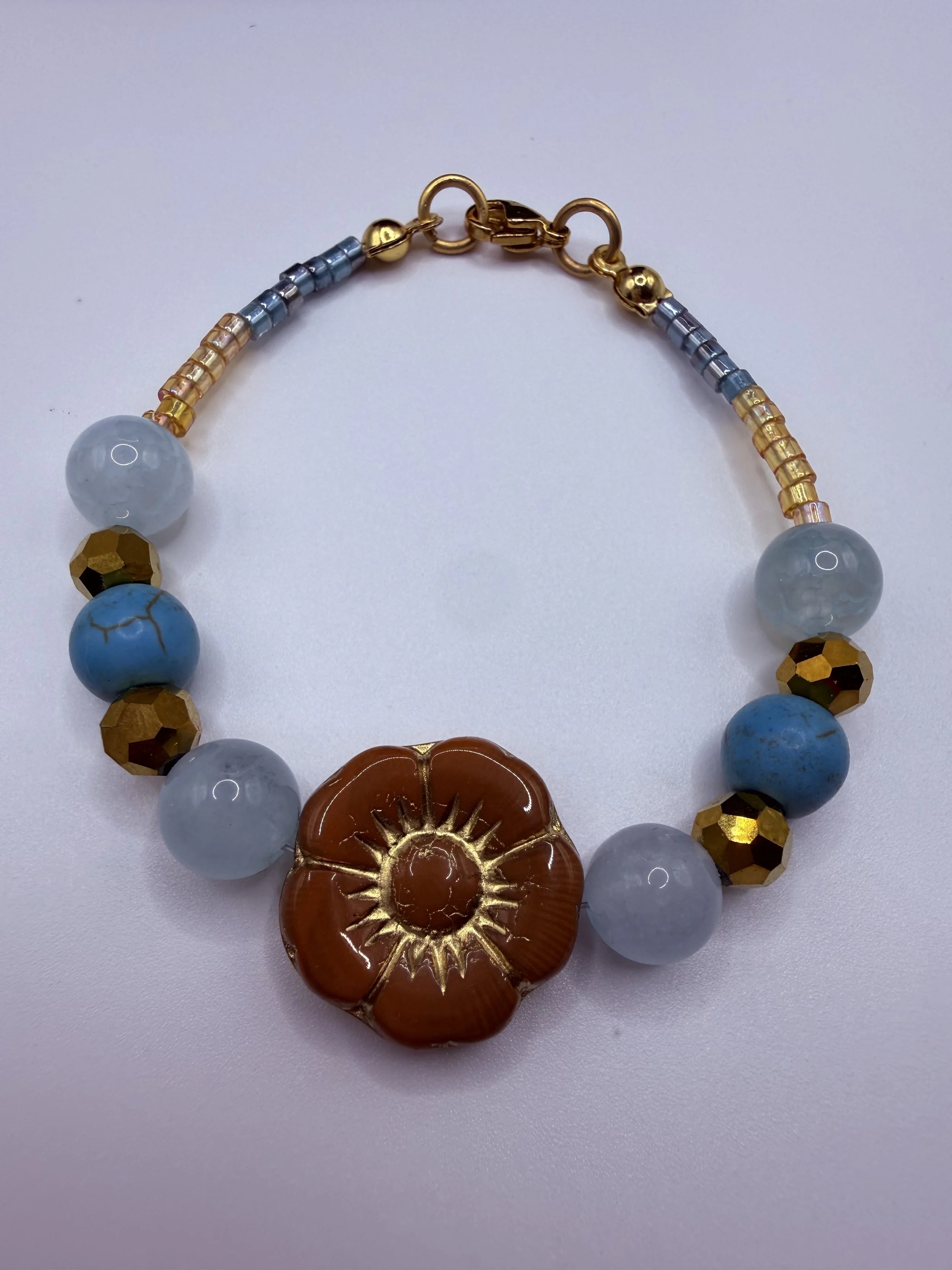 Hibiscus Bloom Bracelet with Light Blue Accents