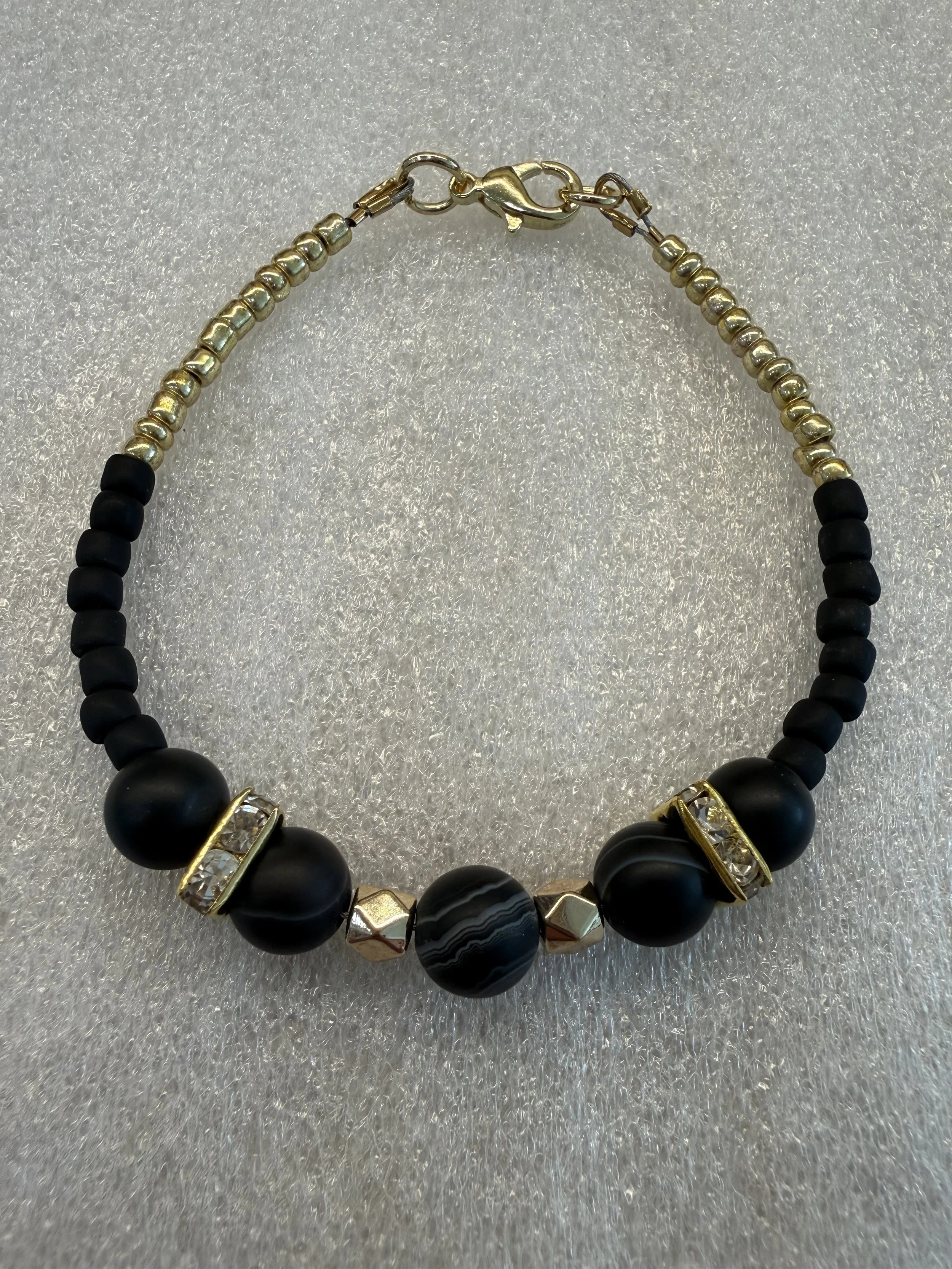 Elegant Black Sardonyx Bracelet with Gold Accents
