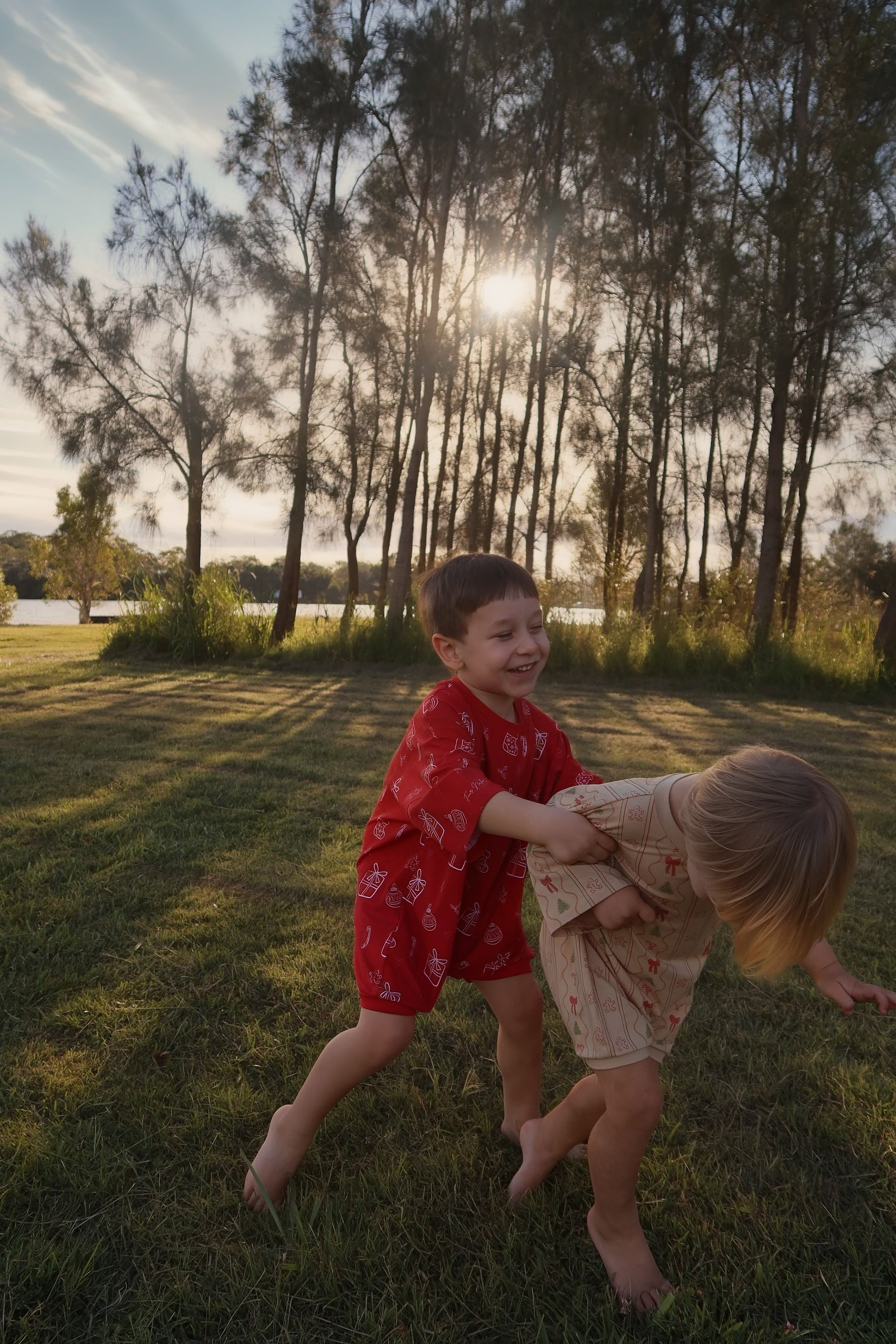 two kids wearing nalo rompers