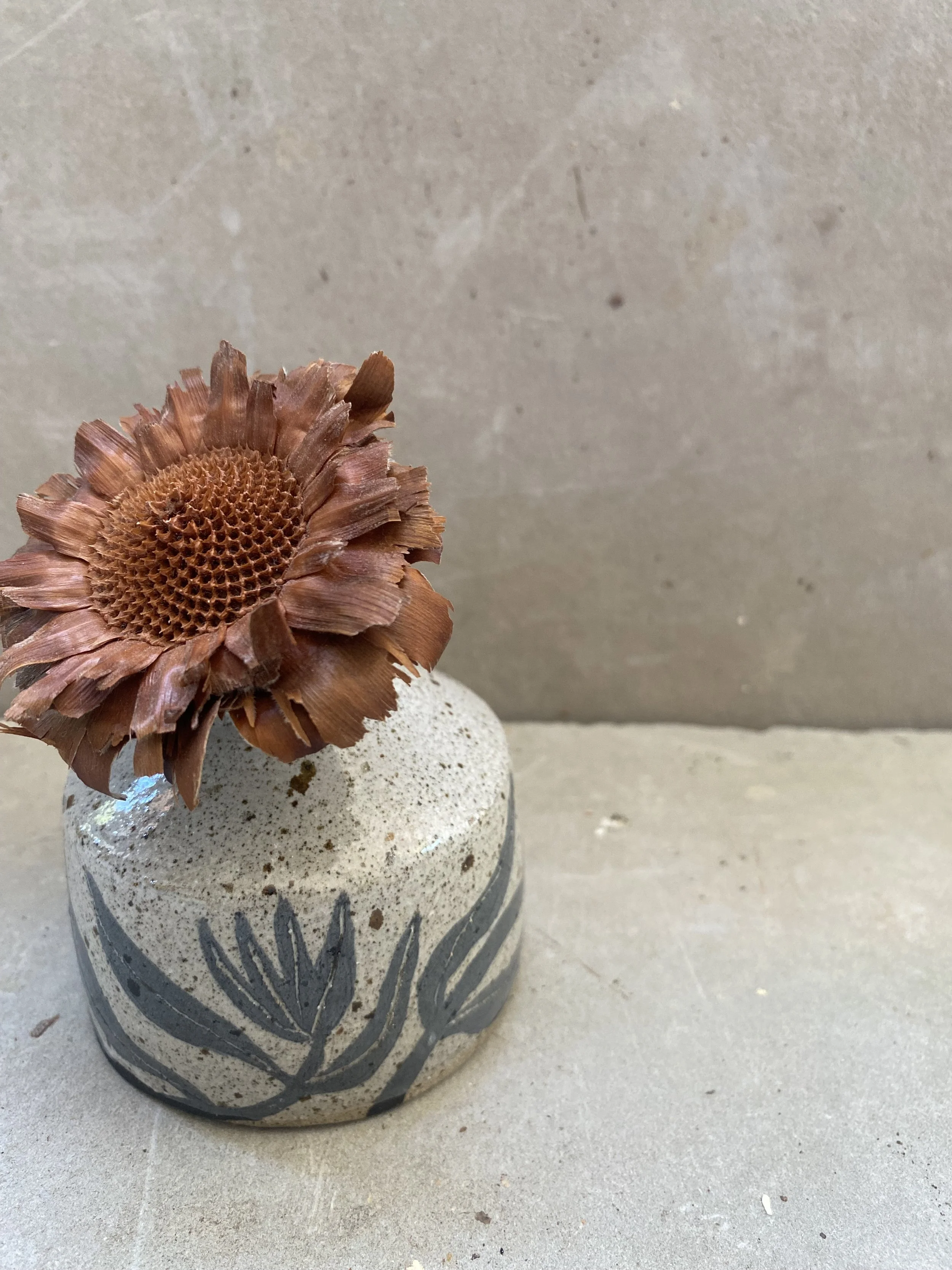 Small speckled flower bud vase