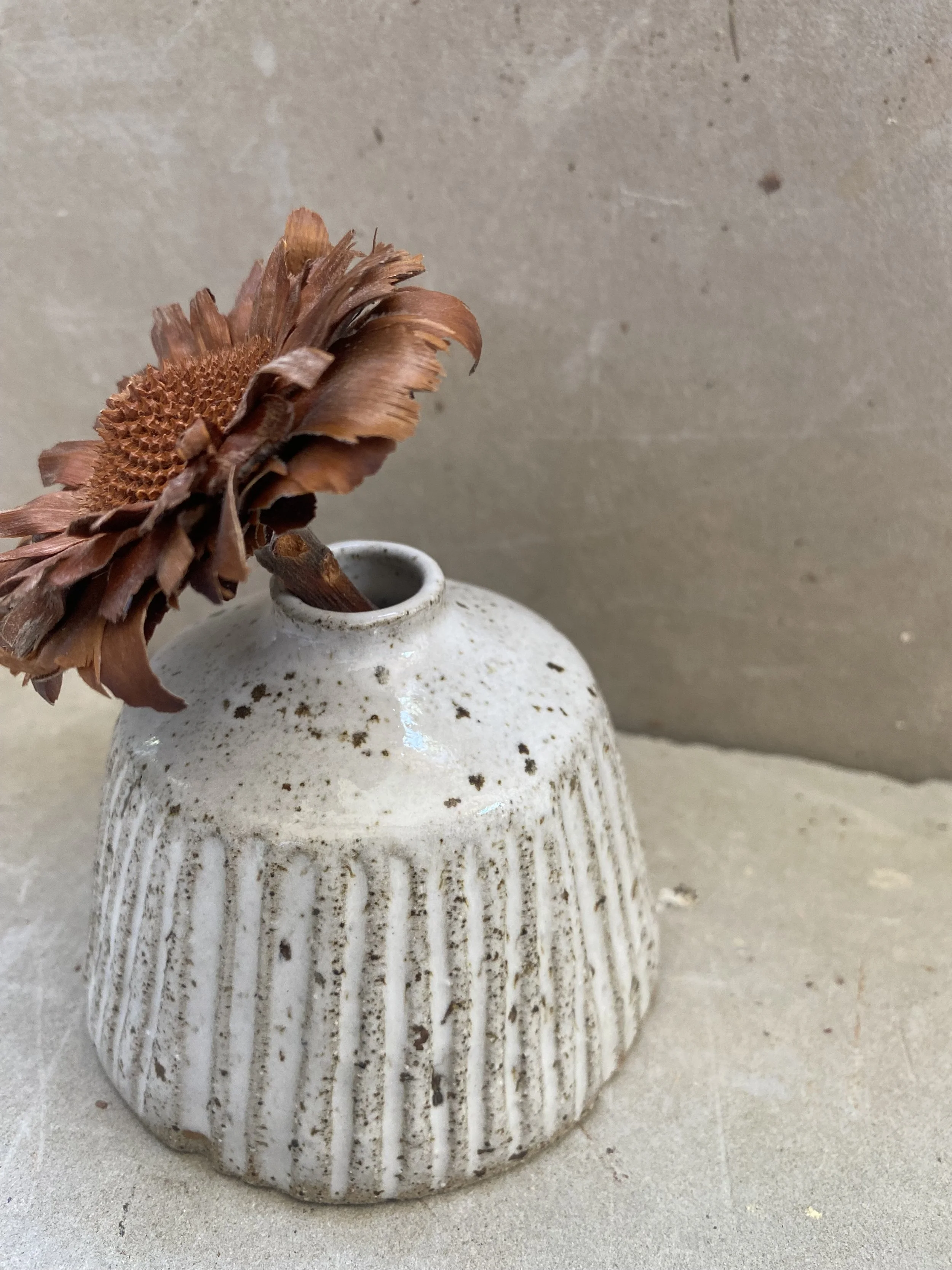 Small lined bud vase