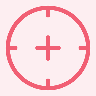 Pink crosshair target on a light pink background.