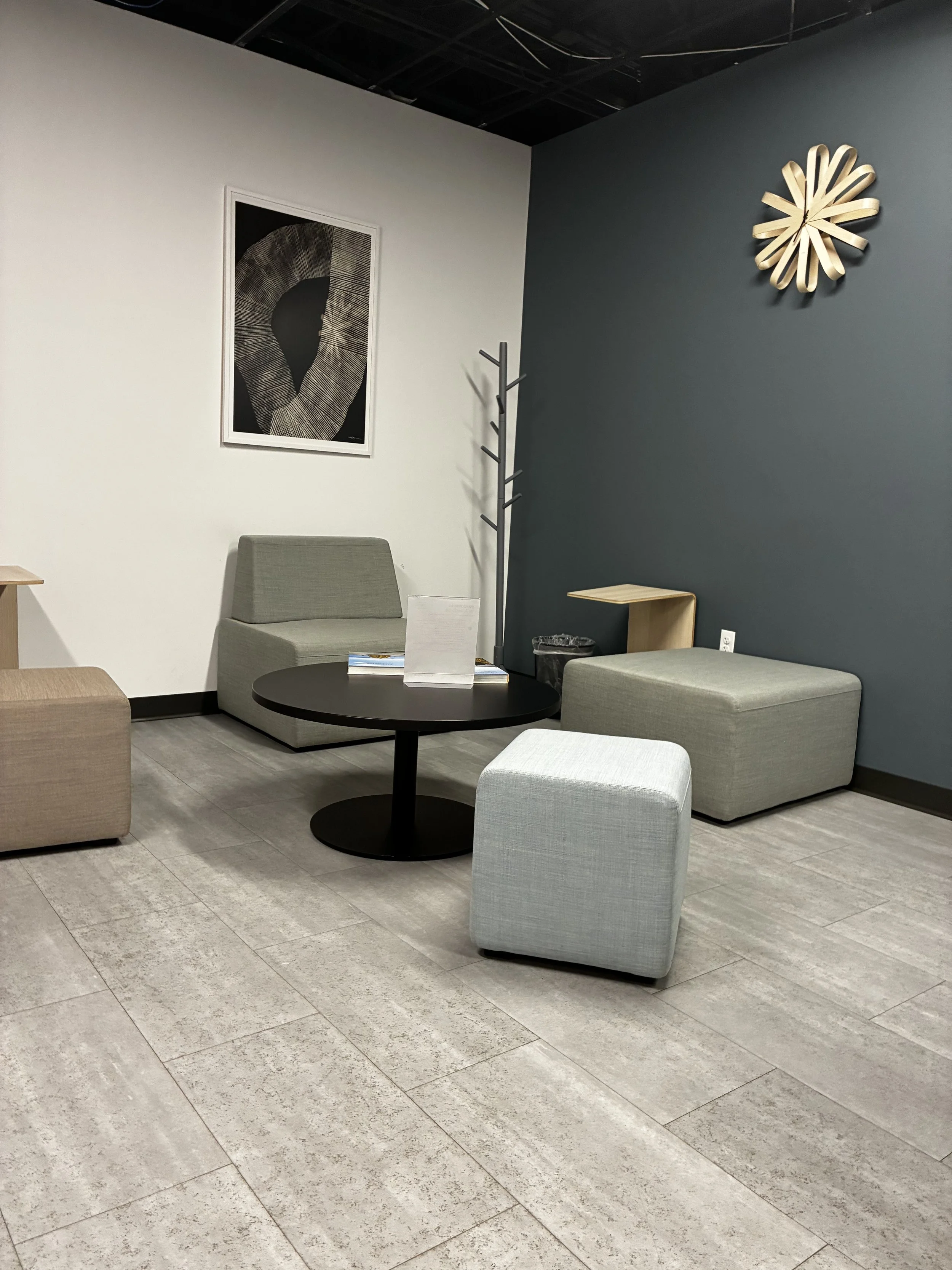 Our welcoming reception space is thoughtfully designed to help clients feel comfortable from the moment they arrive. Featuring warm décor, comfortable seating, and a calming atmosphere, which promotes safety, calmness, and support.