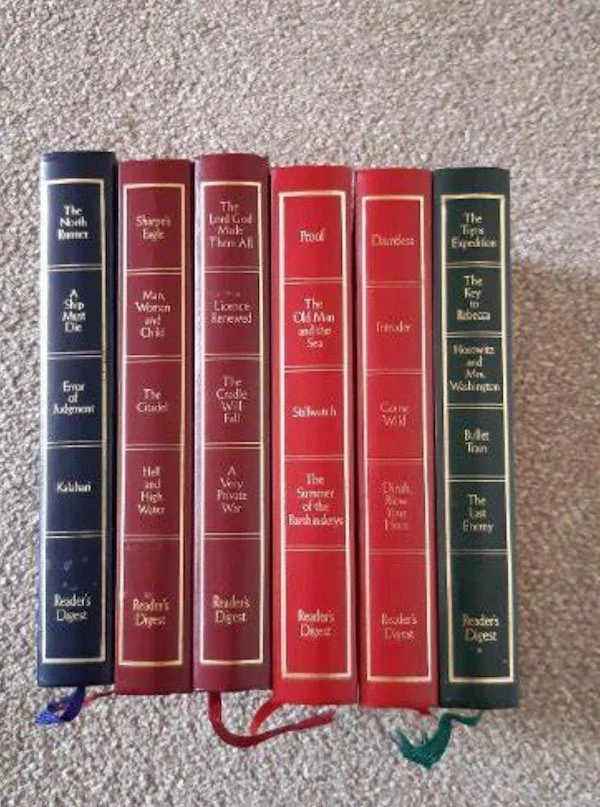 6 different coloured leatherbound Readers Digest spines all together