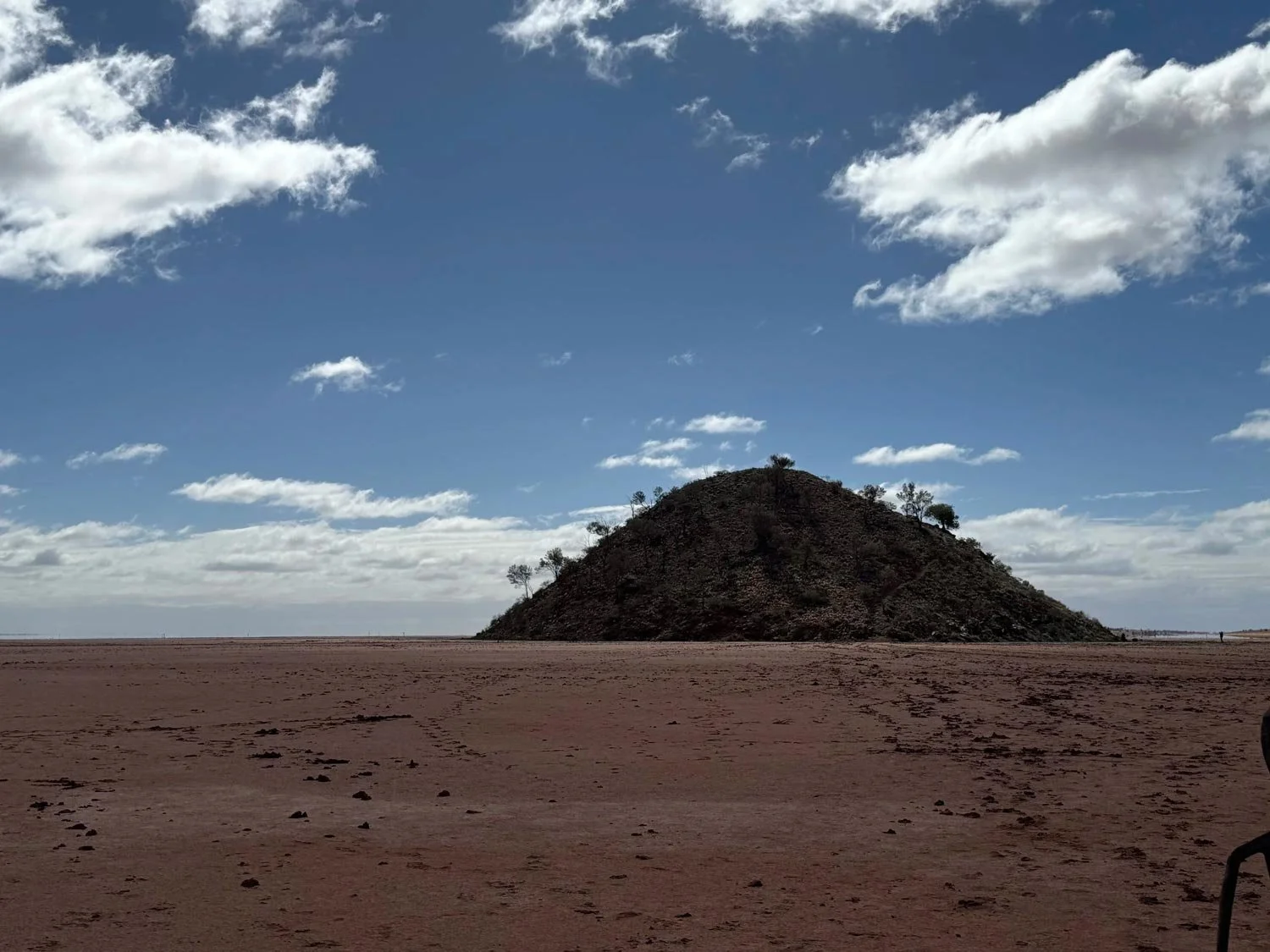 Lake Ballard with island on the lake, blue skies with a few fluffly clouds