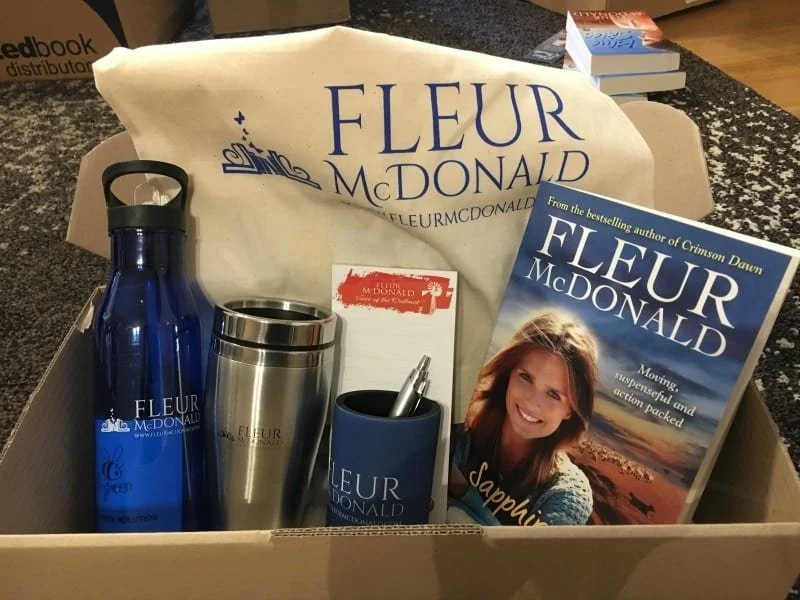 A gift pack containing Sapphire Falls, and Fleaur McDonald merchandise