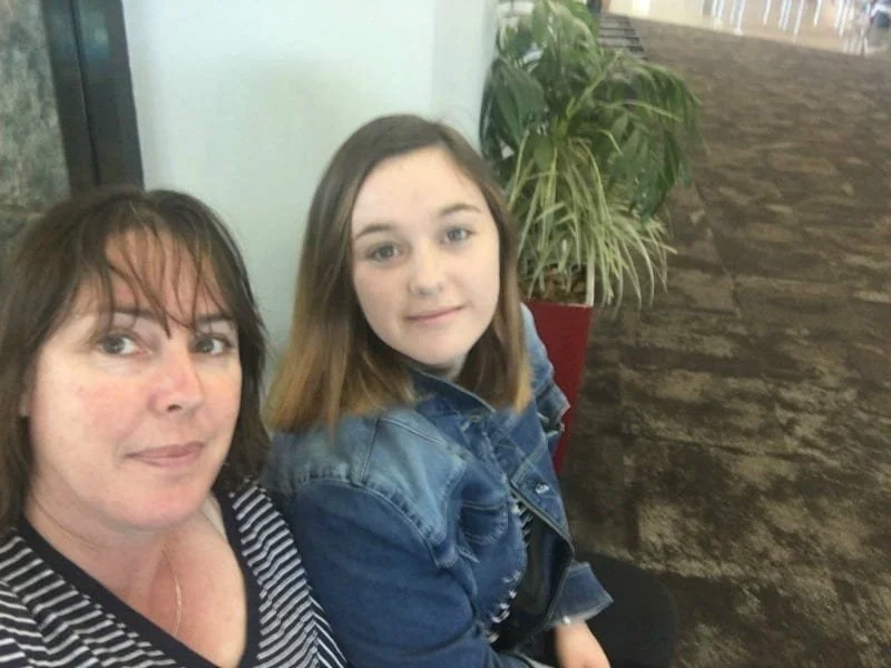 Fleur and her daughter pose for a selfie together